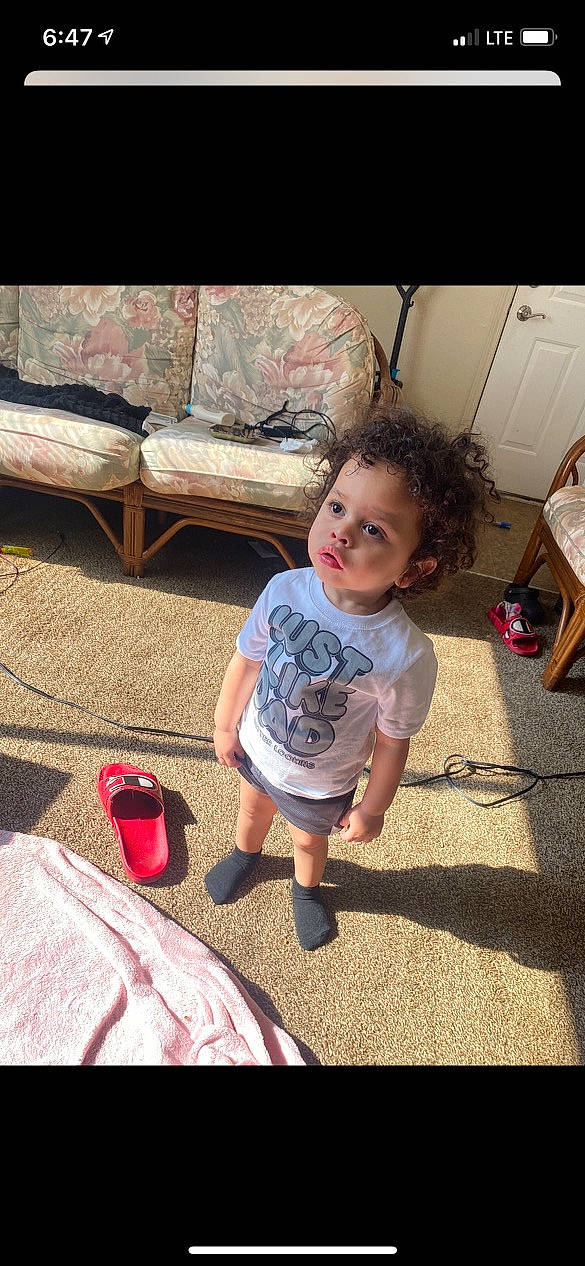 Kayden is registered to the contest to win money with this photo: baby_toddler_clothing, child, cool, floor, flooring, fun, happy, head, human_body, leg, leisure, mammal, person, shoe, shorts, smile, sneakers, thigh, toddler, tree
