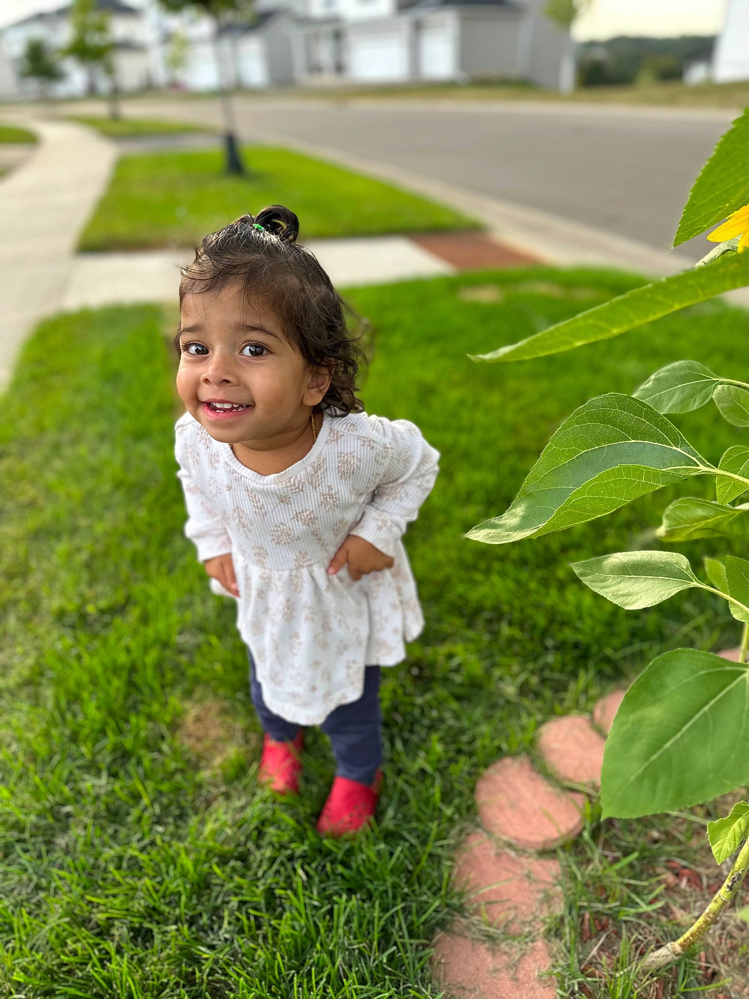 Ivanna is registered to the contest to win money with this photo: child, fun, garden, grass, grassland, green, groundcover, happy, joy, landscape, lawn, leaf, leisure, people_in_nature, person, plant, recreation, smile, sunglasses, terrestrial_plant