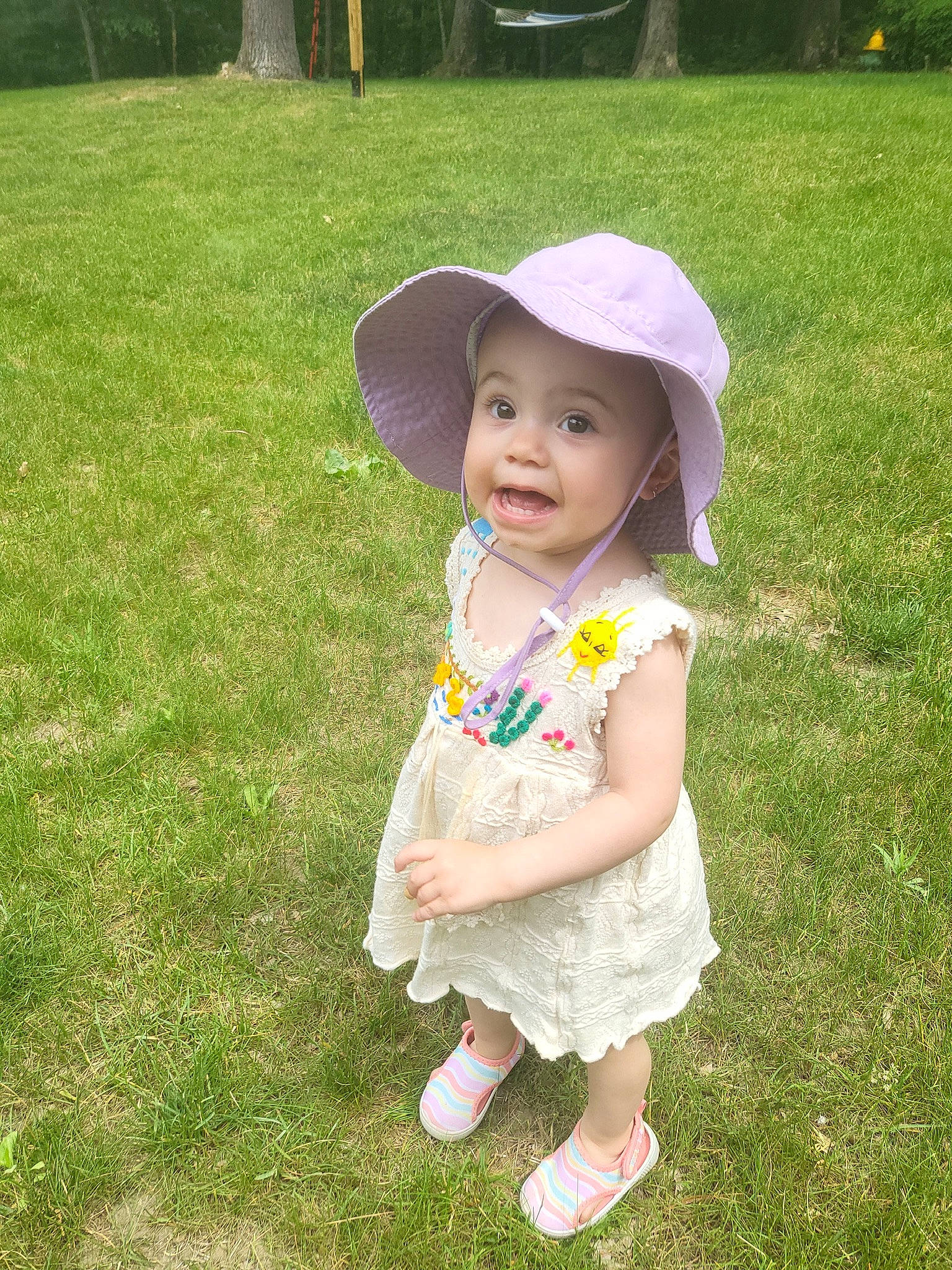 Kendra joined the competition — help win amazing prizes! baby, baby_toddler_clothing, botany, cap, clothing, fun, grass, grass_family, grassland, happy, hat, headwear, lawn, meadow, people_in_nature, person, pink, plant, smile, sun_hat