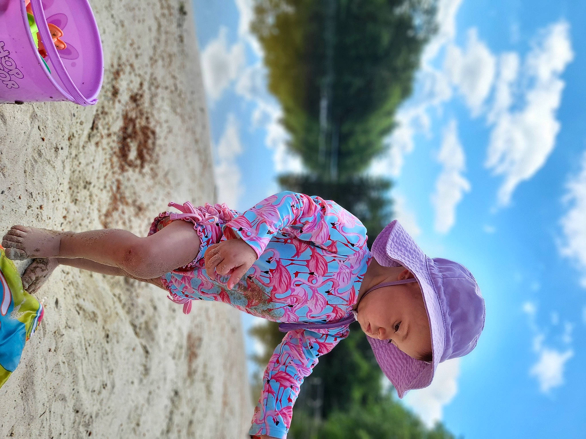 Kendra joined the competition — help win amazing prizes! azure, beach, beauty, blue, cloud, cool, facial_expression, fun, happy, hat, headwear, leisure, people_in_nature, person, pink, plant, recreation, sky, summer, sun_hat