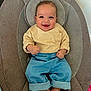 Thiago participe au concours pour gagner de l'argent avec cette photo : baby, child, smiling, happy, infant, clothing, pants, shirt, feet, barefoot, seat, cushion, indoor, person, portrait, casual, cute, young, relaxed, comfort