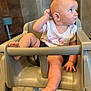 Annabeth joined the competition — help win amazing prizes! baby, child, high_chair, unicorn, shirt, white_clothing, cute, indoor, footwear_absent, barefoot, curious, seated, furniture, floor, skin, hand, face, legs, toes, expression