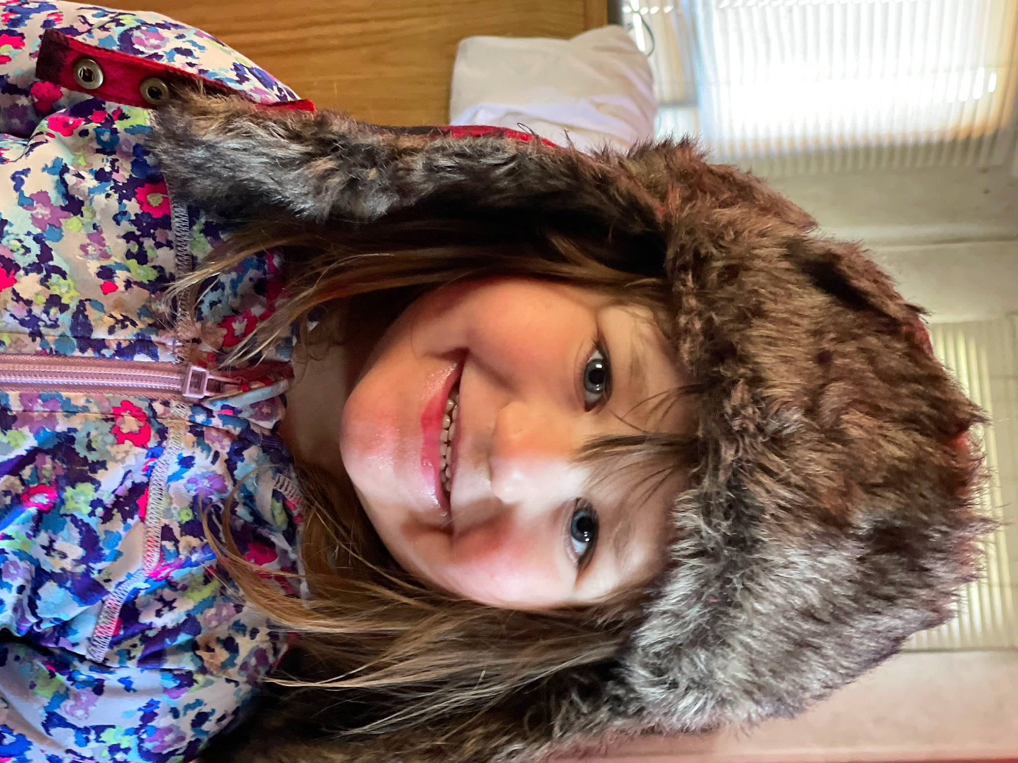Madison is registered to the contest to win money with this photo: blond, brown_hair, child, eye, fun, fur, fur_clothing, happy, hat, headgear, headwear, jacket, joy, lip, nose, outerwear, pattern, person, selfie, smile