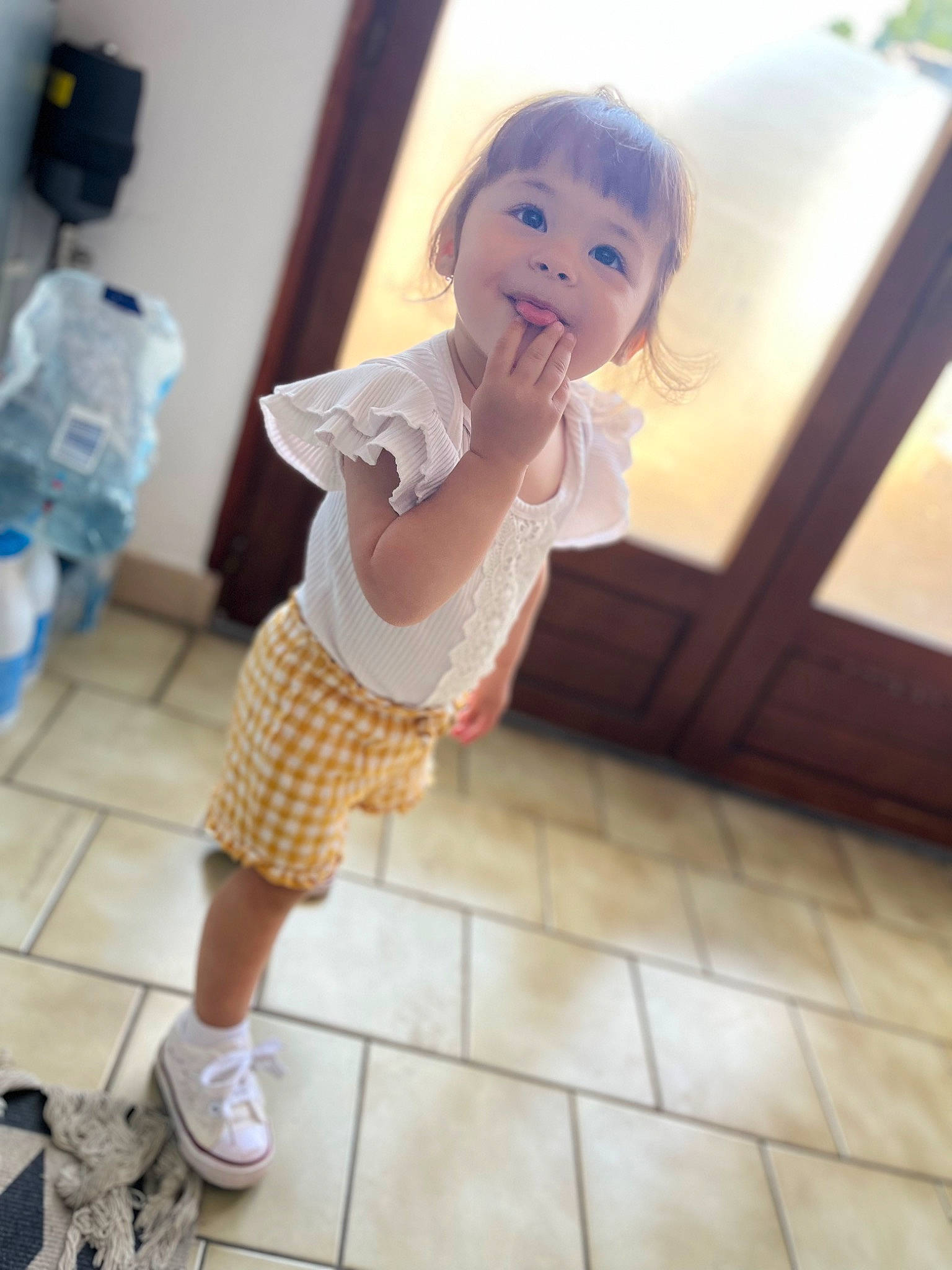 Tyanna a rejoint le concours — aidez-le/la à gagner de superbes lots ! baby, baby_toddler_clothing, cheek, child, face, floor, flooring, fun, happy, human_leg, person, shorts, skin, sleeve, smile, standing, thigh, toddler, waist, walking_shoe