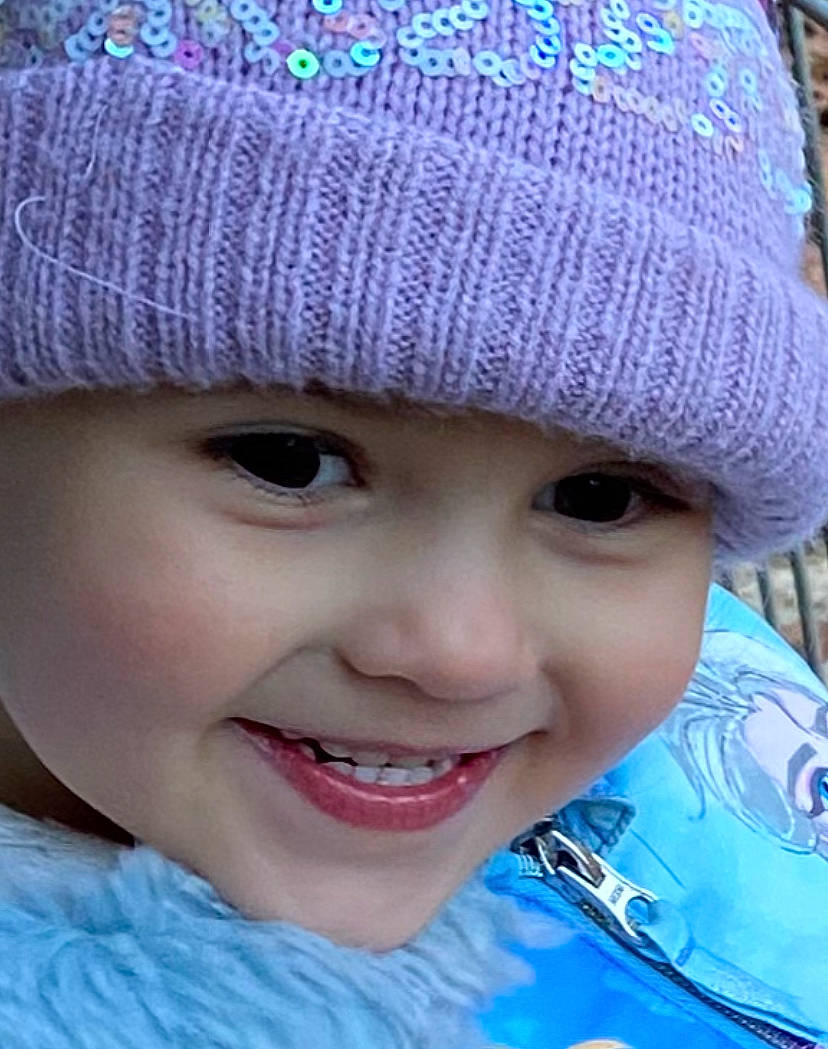 Janelle participe au concours pour gagner de l'argent avec cette photo : azure, blue, cap, cheek, clothing, eye, face, head, headwear, human, joy, light, lip, nose, organ, outerwear, person, photograph, product, purple