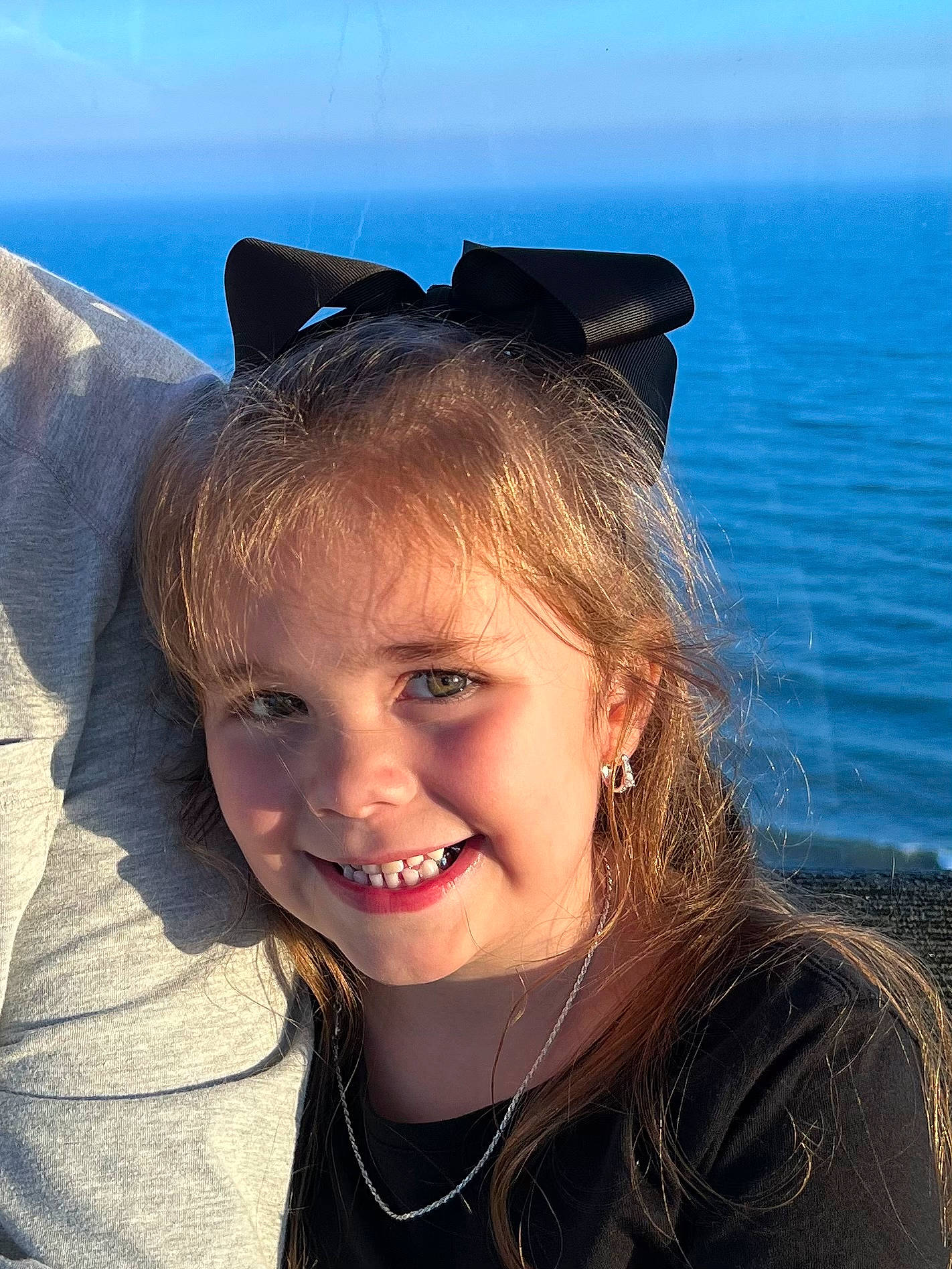 Khloé joined the competition — help win amazing prizes! blue, chin, cool, electric_blue, eye, eyewear, face, flash_photography, fun, hair, happy, head, headgear, jaw, joy, lip, people_in_nature, person, sky, smile