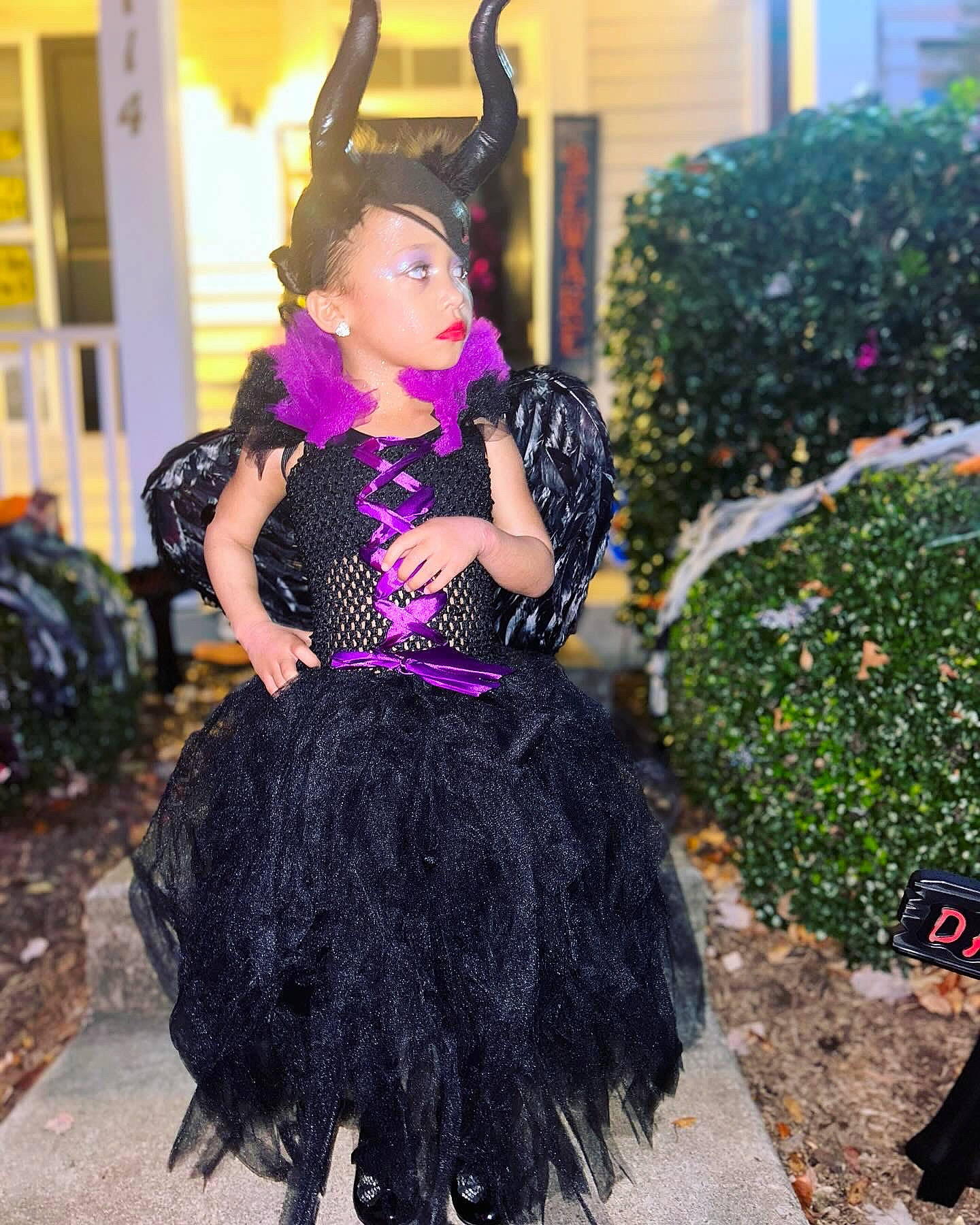Kimora joined the competition — help win amazing prizes! child, costume, entertainment, event, fashion_accessory, fashion_design, formal_wear, fun, fur, hairstyle, happy, magenta, performing_arts, person, pink, plant, purple, tradition, trunk, violet