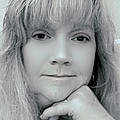 Monica T.