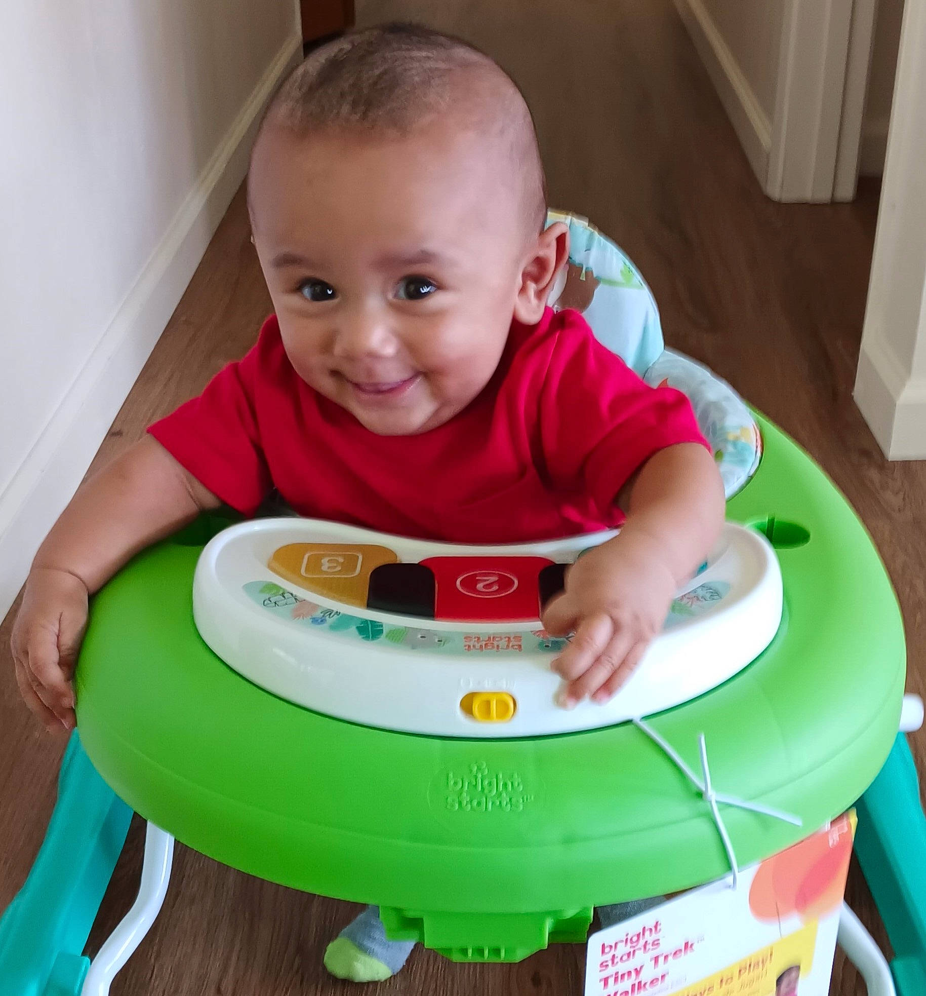 Jayden-kaio is registered to the contest to win money with this photo: baby, baby_playing_with_toys, baby_products, baby_toddler_clothing, baby_toys, bib, chair, child, circle, fun, grass, joy, person, plastic, play, sharing, sitting, smile, sock, table