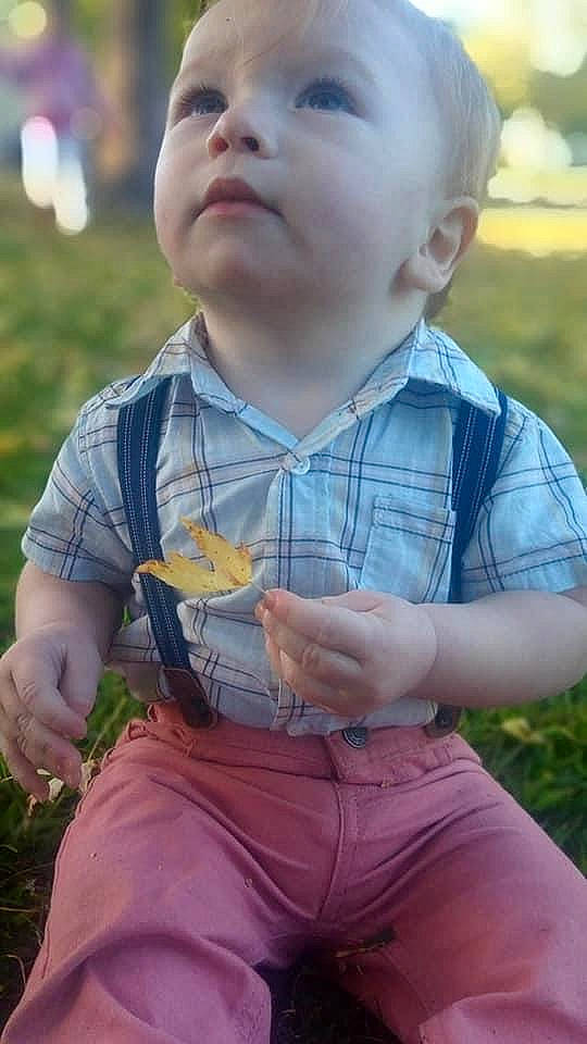 Zackary is registered to the contest to win money with this photo: baby, cheek, child, finger, grass, person, play, smile, toddler
