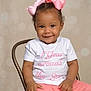 baby, background, chair, child, clothing, cute, face, fashion, girl, hands, happy, indoor, one_year, pink_bow, pink_skirt, portrait, sitting, smile, toddler, white_shirt