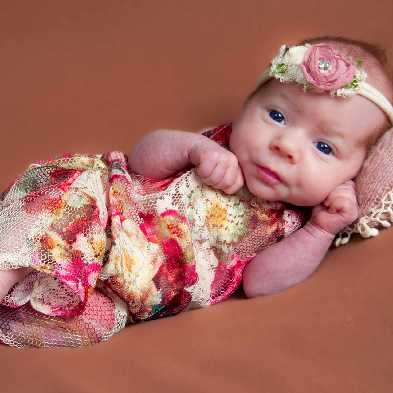 Eilise is registered to the contest to win money with this photo: baby, bodypart, bonnet, clothing, dress, face, finger, flower, hand, happy, hat, head, newborn, person, photography, plant, portrait, rose, smile, toe