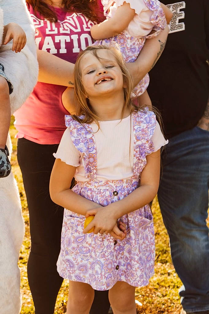 Brooklynn is registered to the contest to win money with this photo: blond, child, entertainment, event, fashion, fashion_design, fun, gesture, hairstyle, happy, interaction, joy, leisure, magenta, performing_arts, person, pink, purple, recreation, t_shirt