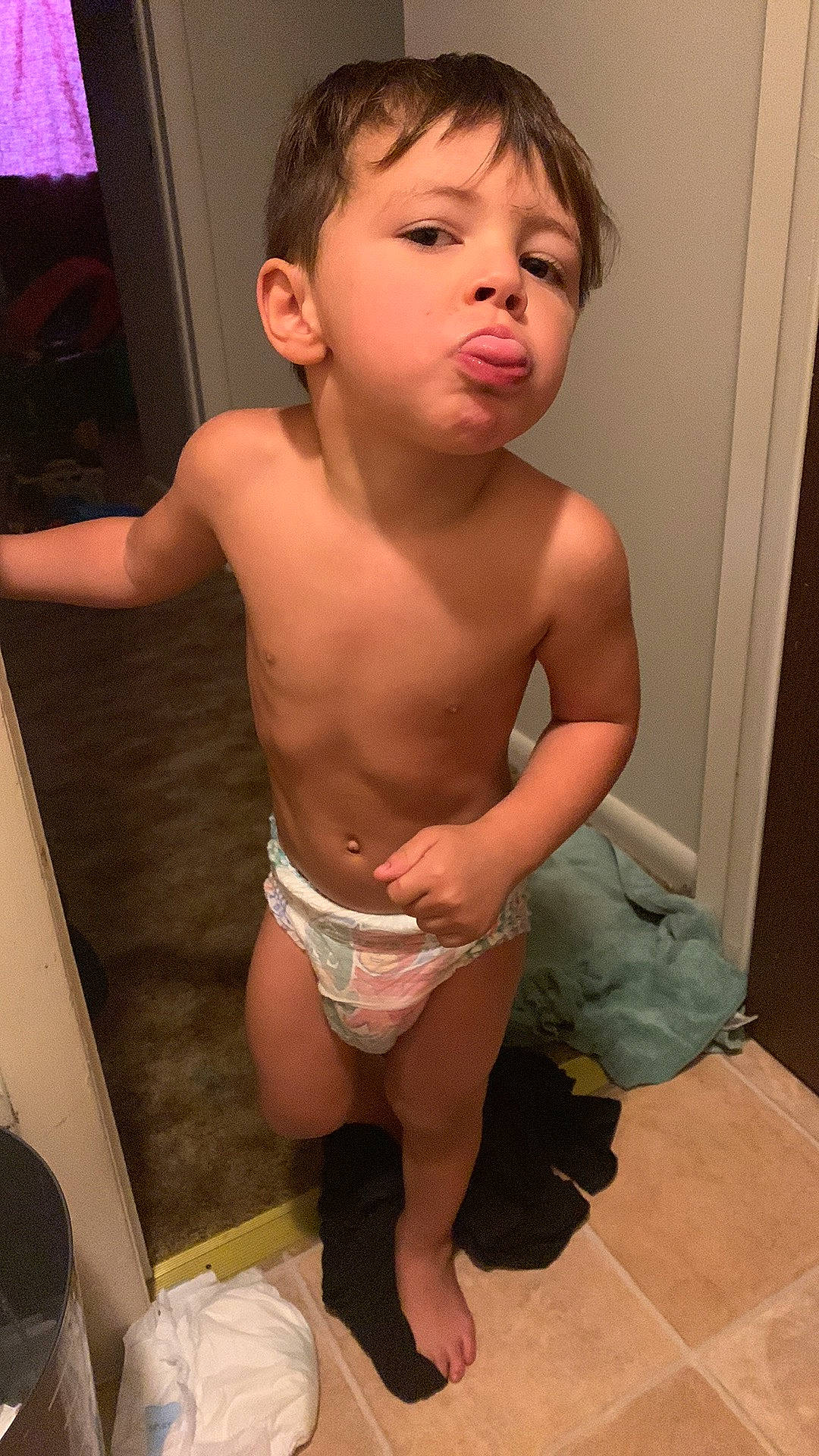 Dean is registered to the contest to win money with this photo: cheek, chest, chin, face, human_body, iris, joint, knee, leg, lip, mouth, muscle, neck, nose, person, skin, stomach, thigh, thumb, toddler