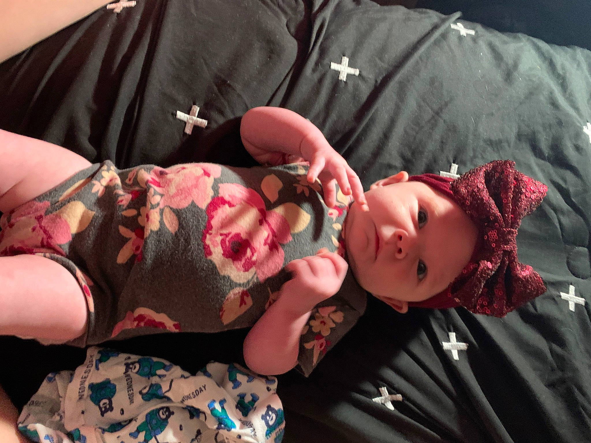 Audri is registered to the contest to win money with this photo: abdomen, baby, black_hair, chest, elbow, eyelash, finger, human, human_body, joint, lip, mouth, muscle, pattern, person, pink, skin, tattoo, textile, thigh