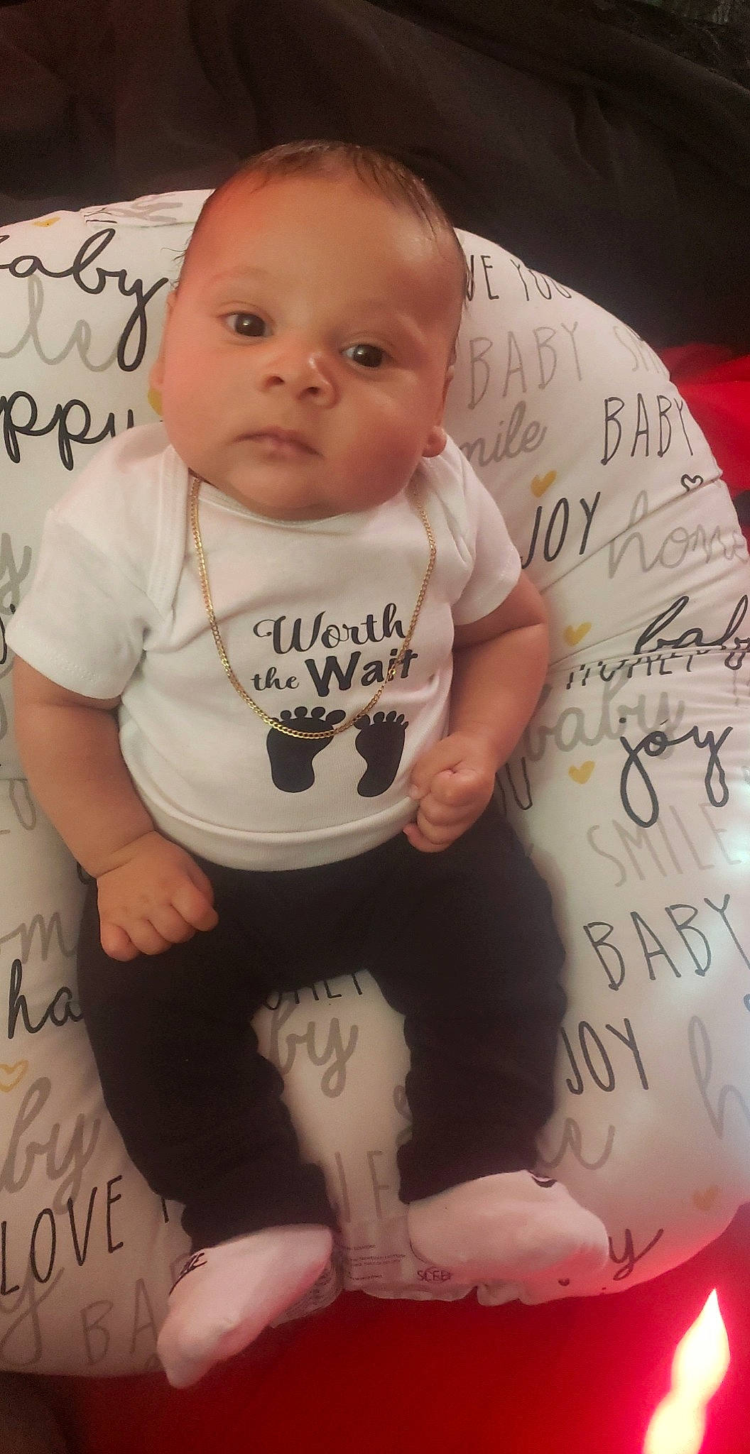 Bryce joined the competition — help win amazing prizes! baby, baby_toddler_clothing, black, cheek, child, comfort, eyelash, face, finger, font, handwriting, happy, pattern, person, pink, sitting, skin, sleeve, t_shirt, toddler