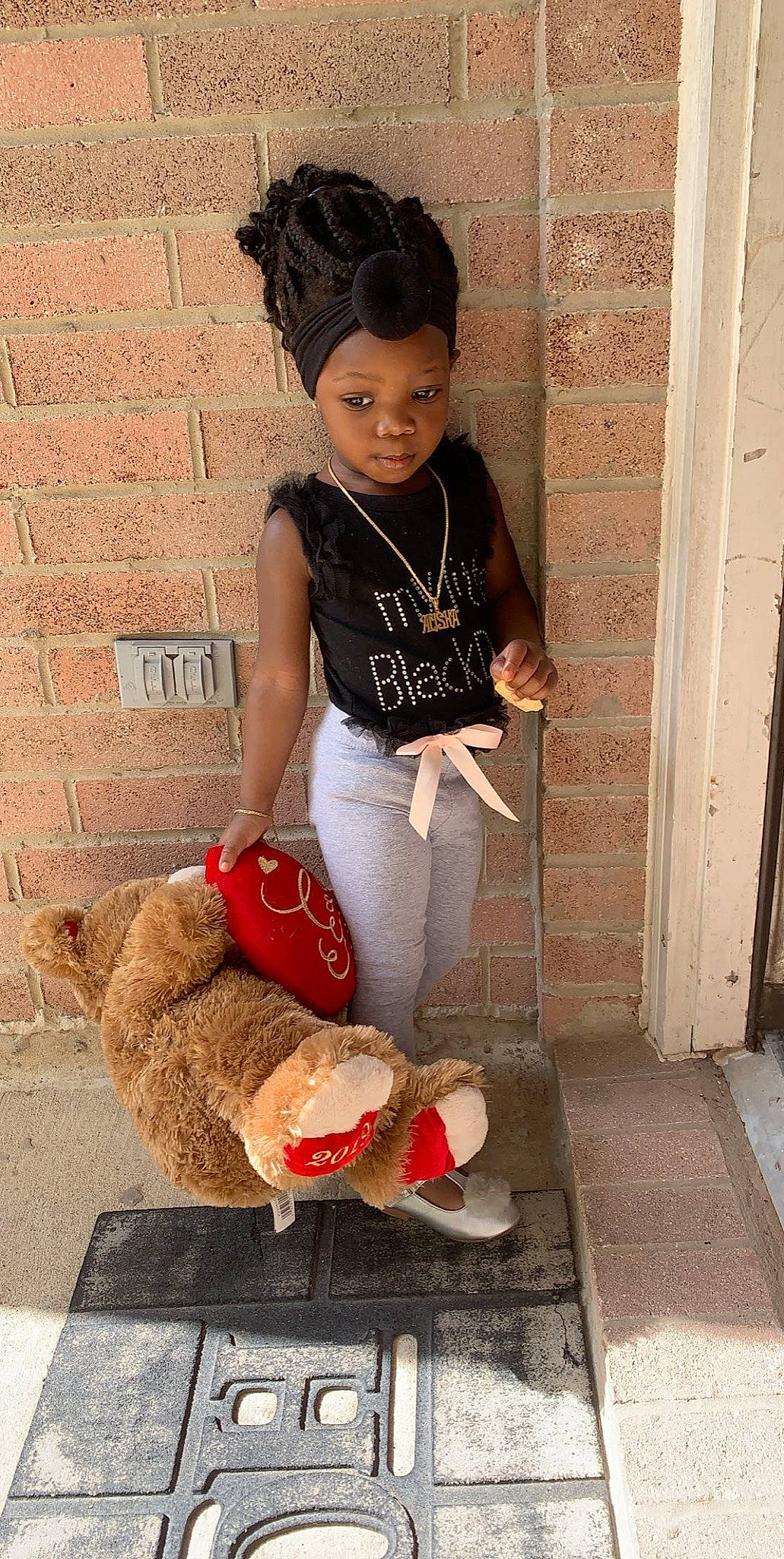 Alisha is registered to the contest to win money with this photo: child, child_model, footwear, hairstyle, jeans, leg, person, shoe, sitting, toddler