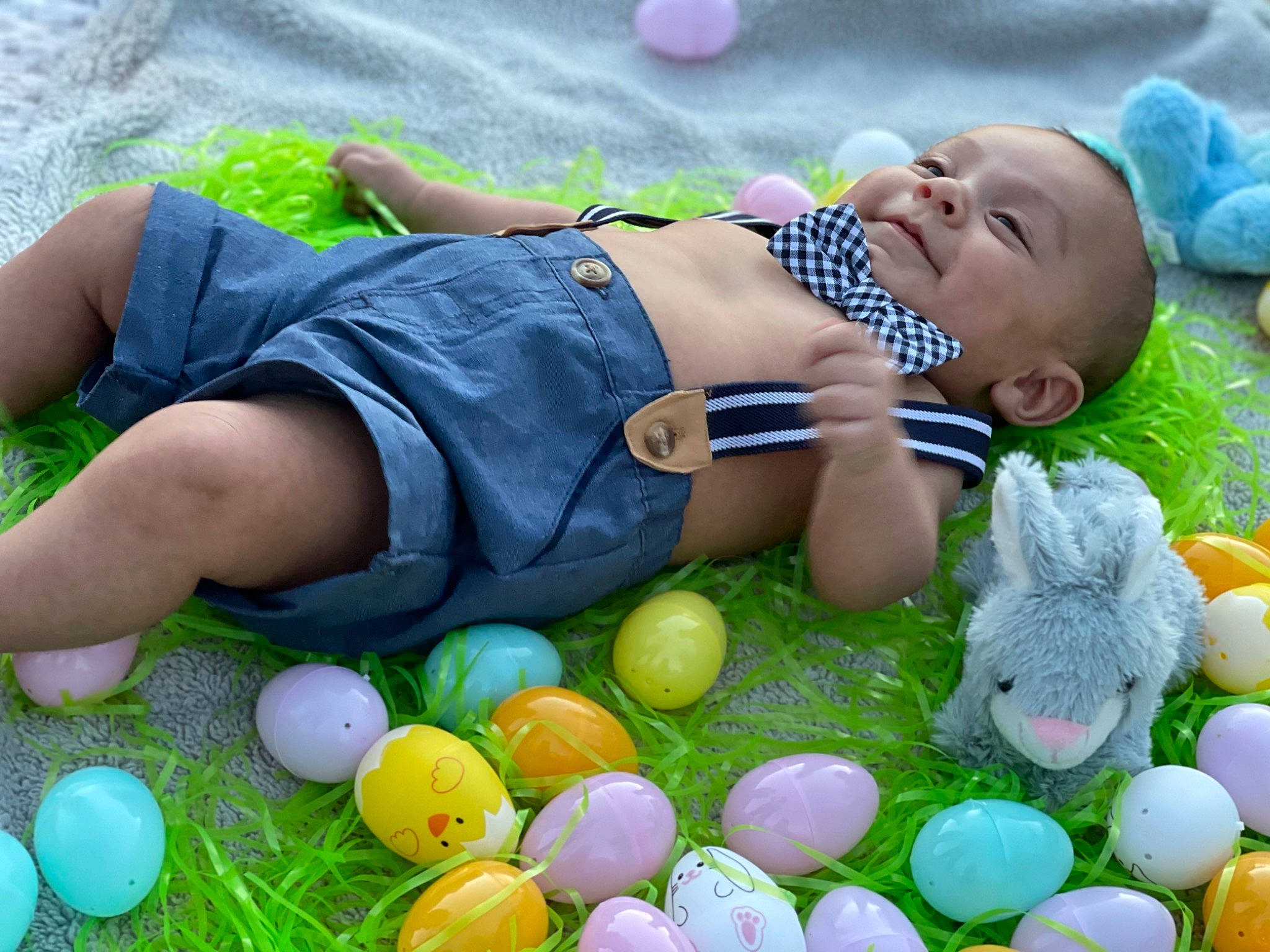 Cj is registered to the contest to win money with this photo: baby, baby_toddler_clothing, child, easter, event, fun, grass, green, happy, leisure, people, people_in_nature, person, photograph, play, recreation, shorts, smile, thigh, toddler
