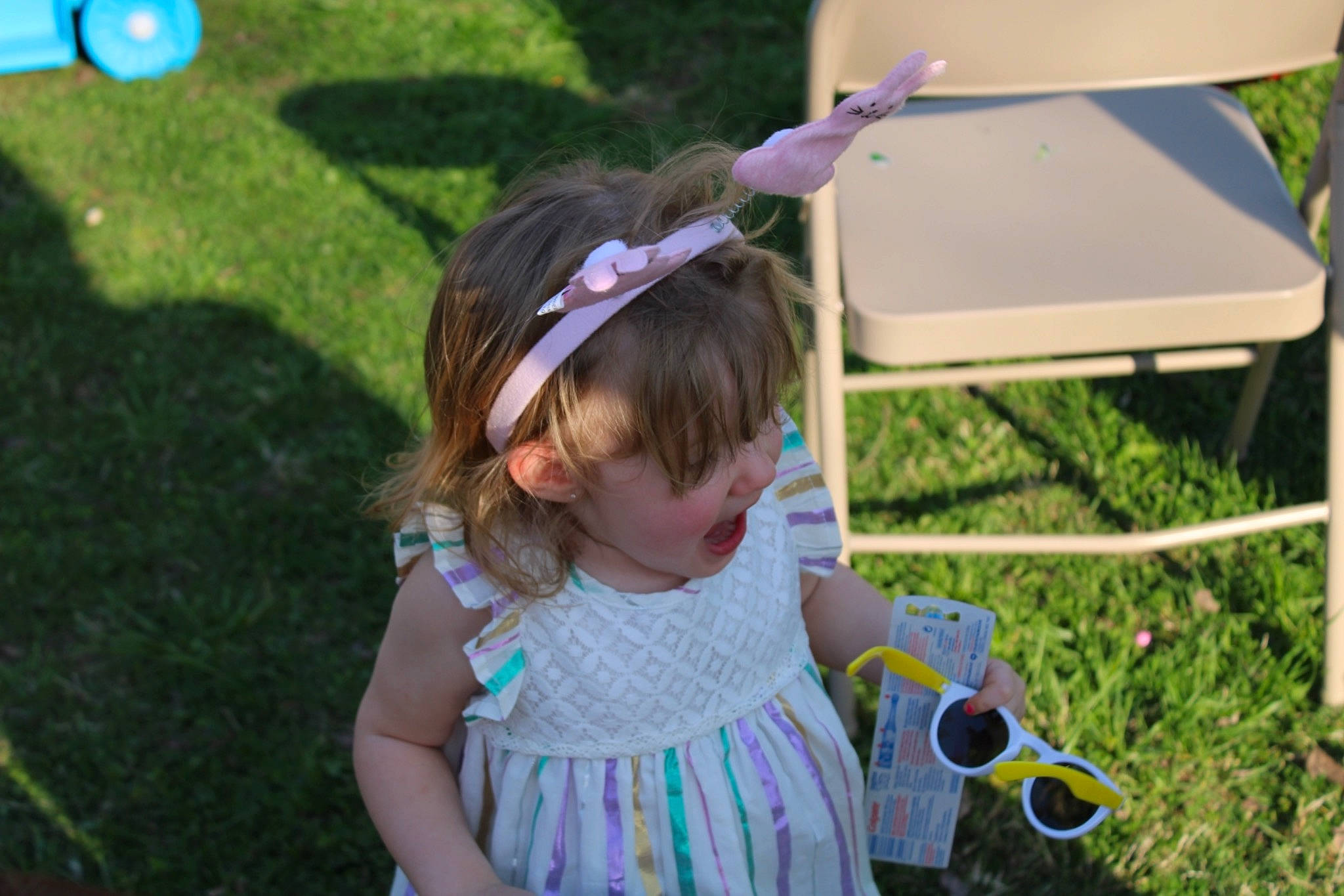 Paradise joined the competition — help win amazing prizes! baby_toddler_clothing, child, dress, event, eyewear, fashion_accessory, fun, grass, happy, hat, lawn, leisure, mammal, party_supply, pattern, person, plant, recreation, spring, summer