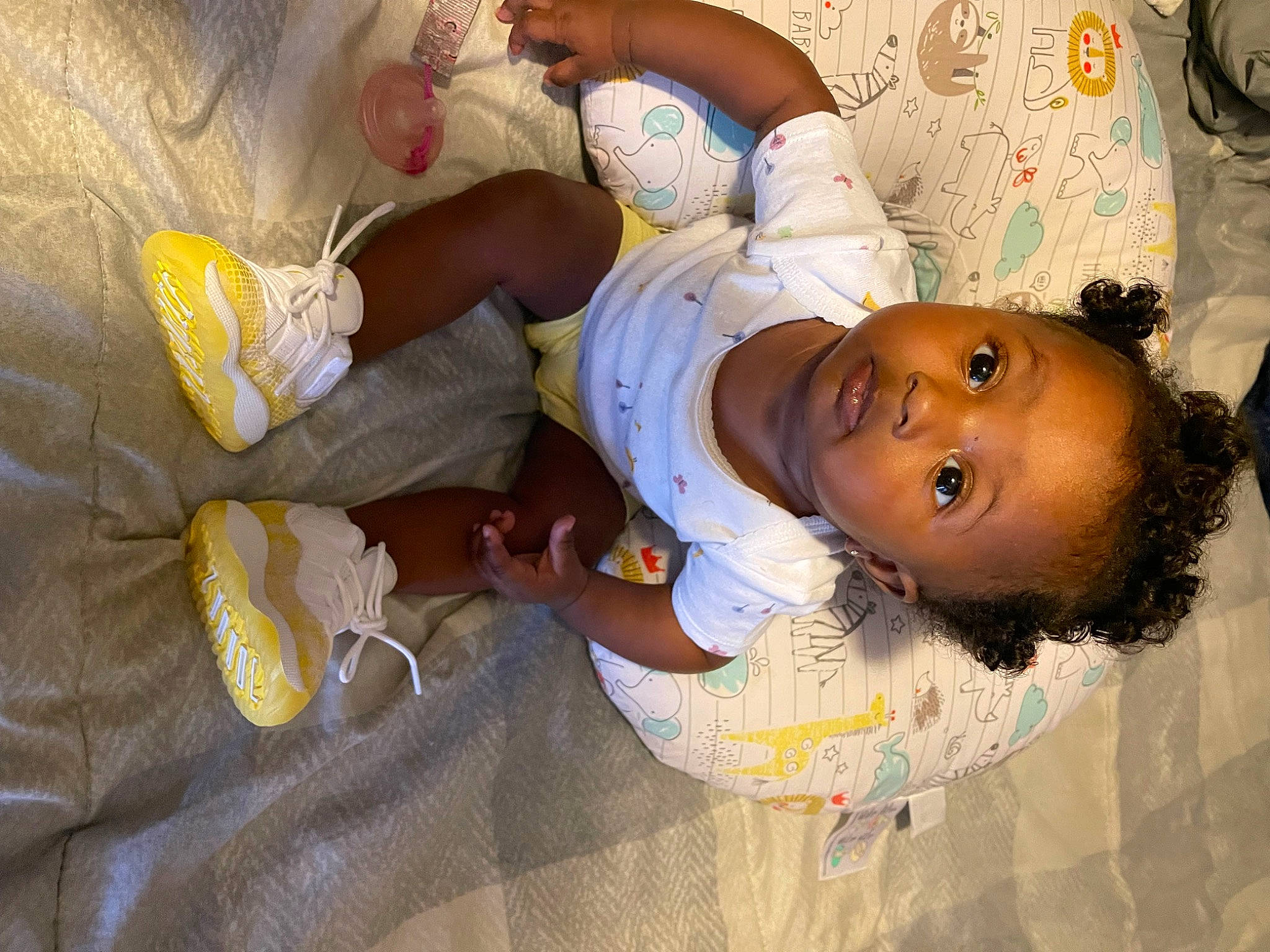 Moriah is registered to the contest to win money with this photo: arm, baby, baby_products, baby_toddler_clothing, cheek, child, comfort, fun, happy, hat, leisure, linens, person, room, toddler