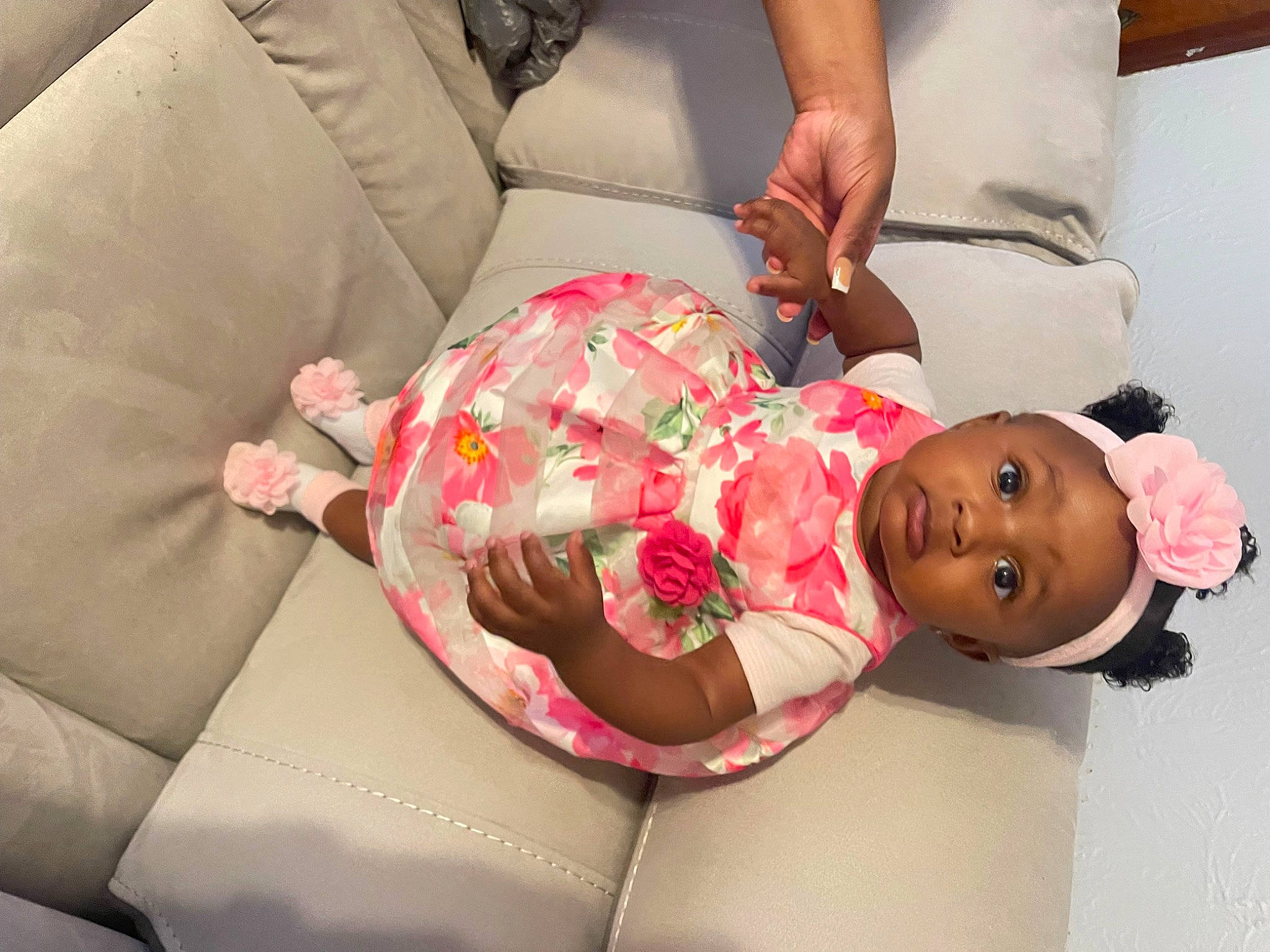 Moriah is registered to the contest to win money with this photo: abdomen, baby, baby_toddler_clothing, cheek, child, comfort, couch, headwear, human_body, human_leg, lap, leg, linens, mouth, person, pink, room, skin, textile, thigh