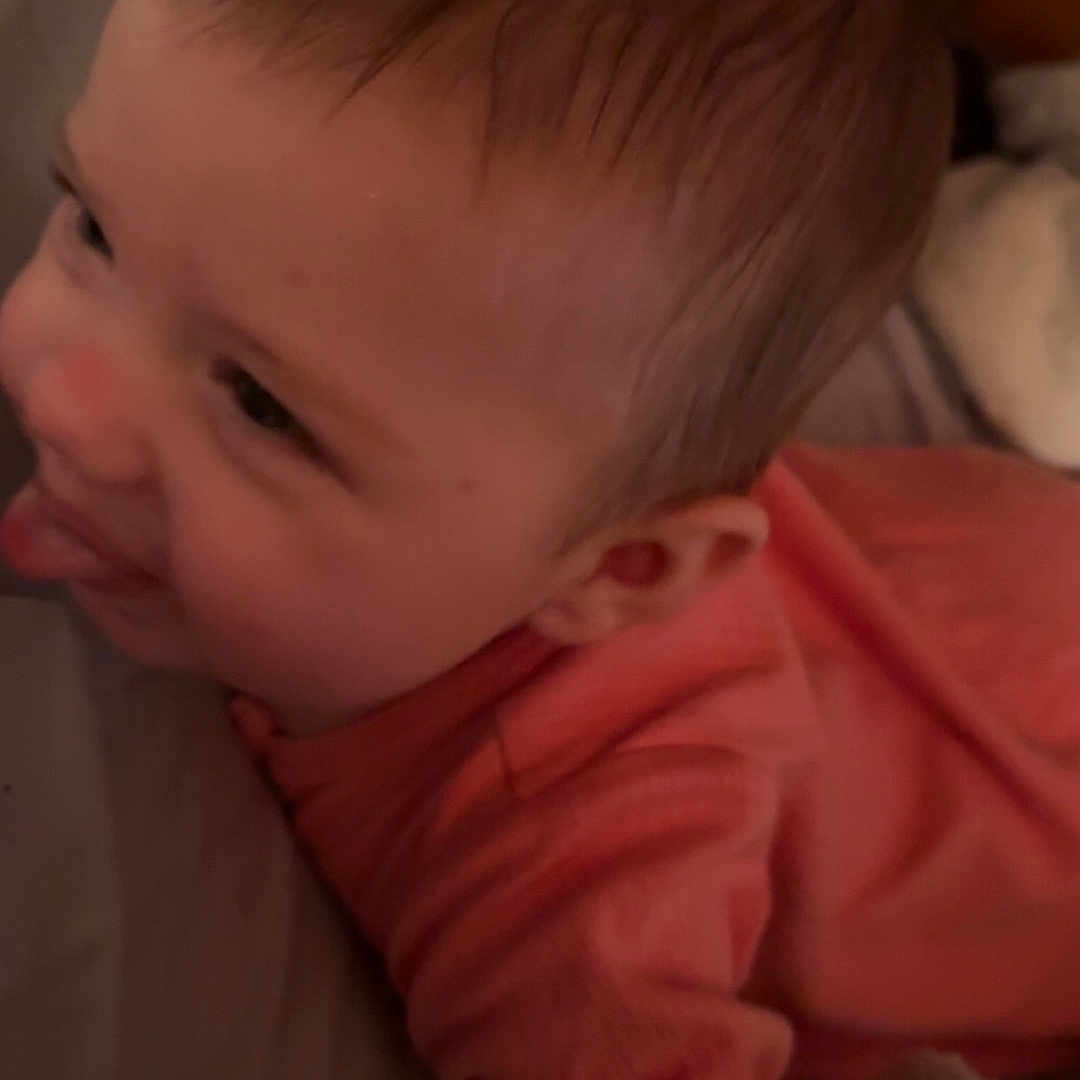 Oakley joined the competition — help win amazing prizes! baby, blanket, bodypart, clothing, couch, cushion, ear, face, finger, furniture, hand, happy, head, homedecor, knitwear, newborn, person, photography, portrait, smile