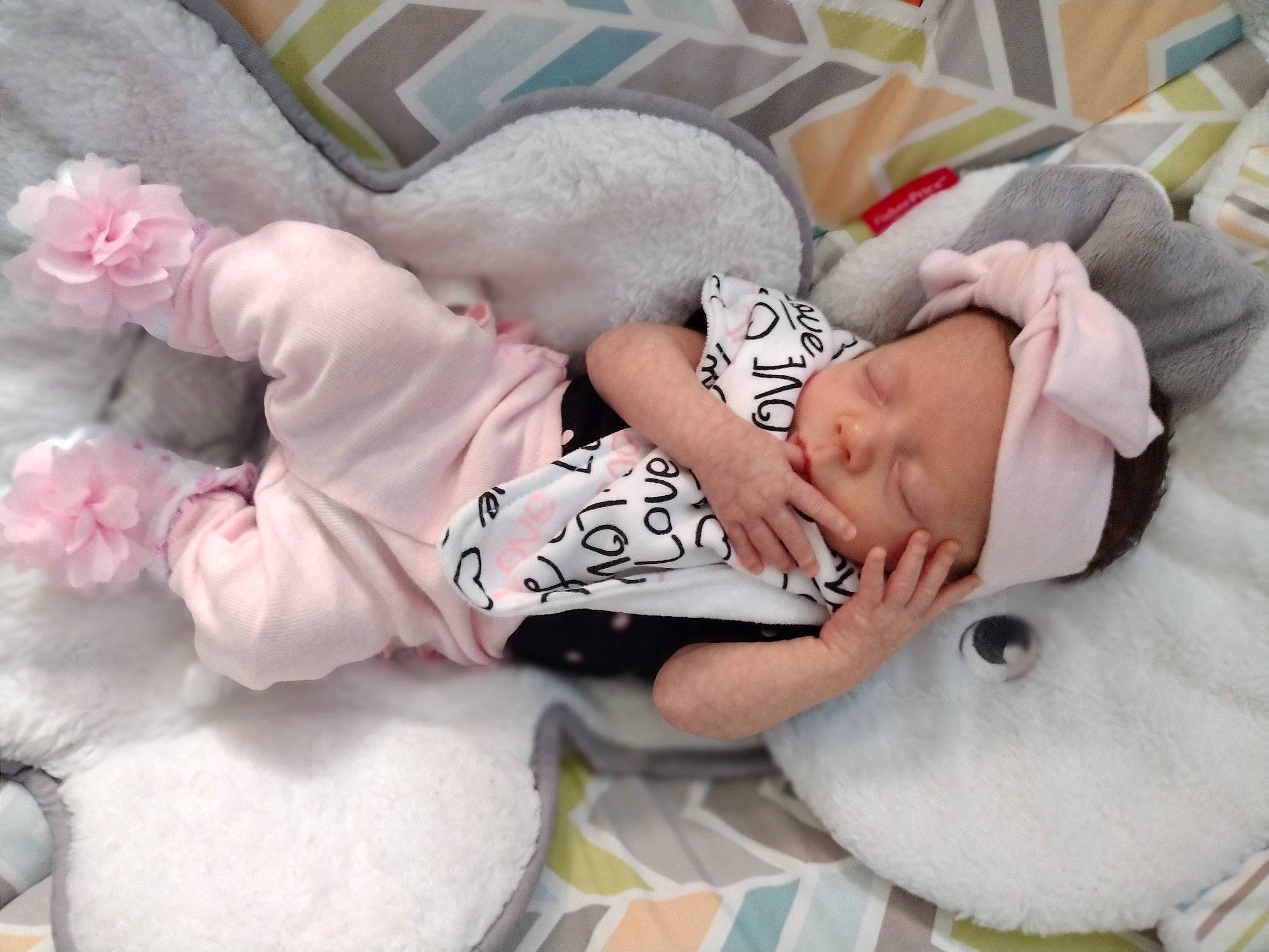 Lily joined the competition — help win amazing prizes! baby, baby_products, baby_sleeping, baby_toddler_clothing, beauty, cheek, child, comfort, dress, face, hand, head, headgear, linens, mammal, person, pink, product, skin, sleeve
