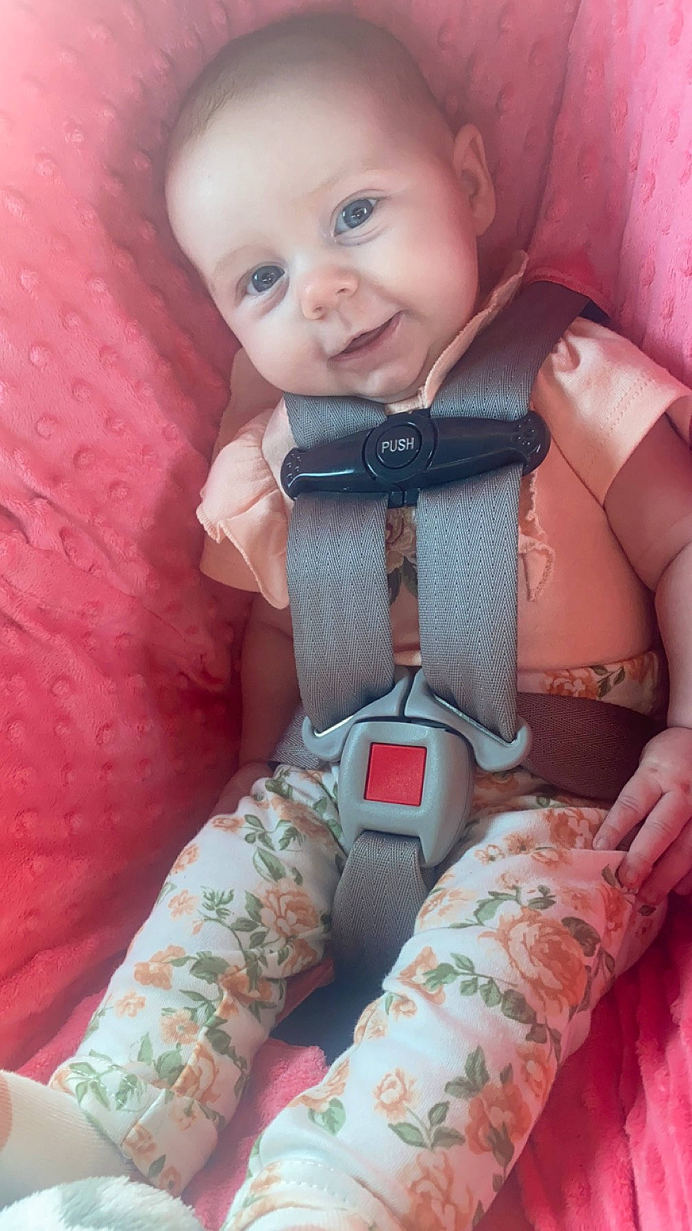 Layana joined the competition — help win amazing prizes! baby, baby_in_car_seat, baby_toddler_clothing, camouflage, car_seat, cheek, child, comfort, eye, eyelash, finger, outerwear, pattern, person, pink, seat_belt, skin, sleeve, smile, textile