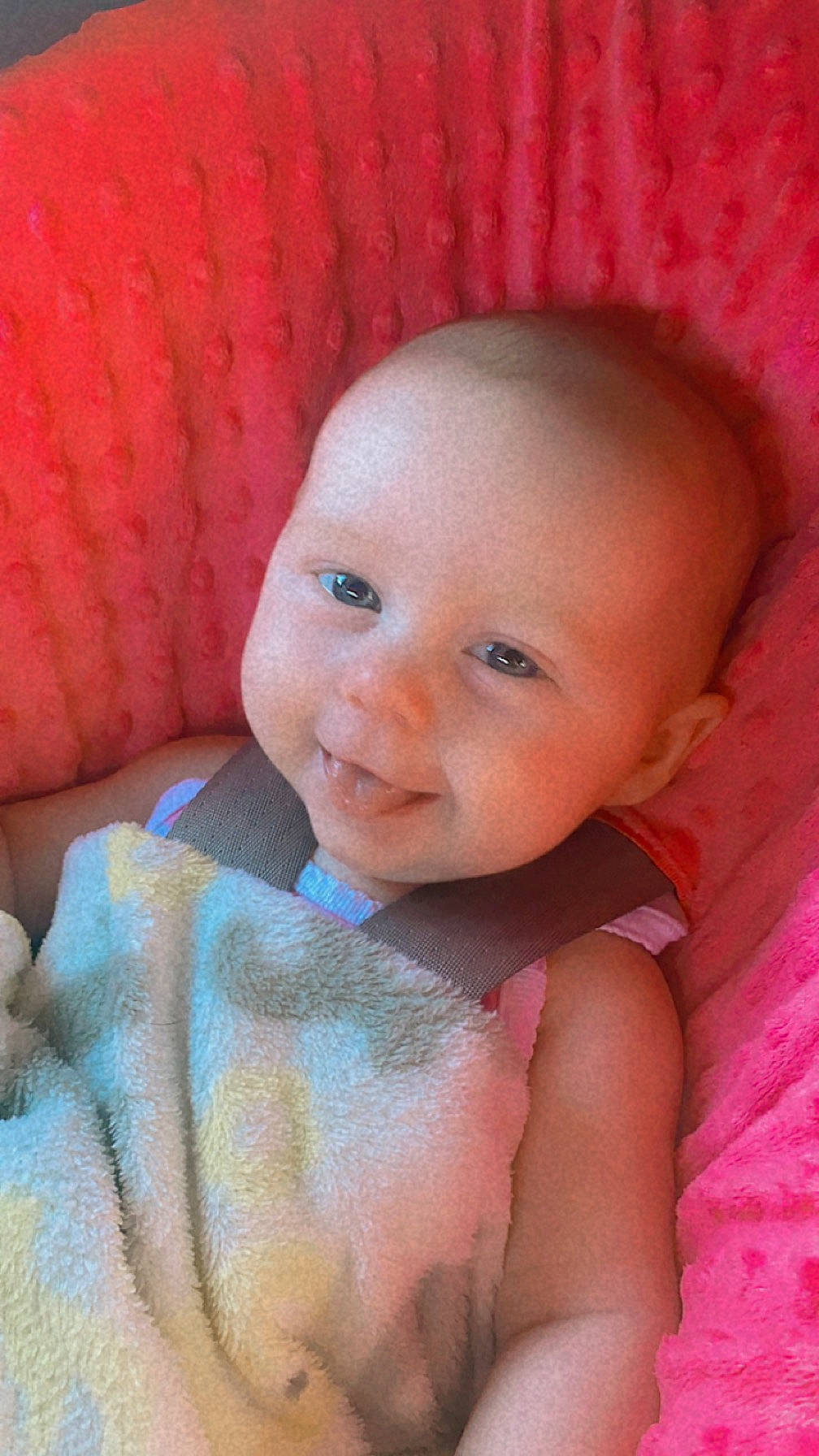 Layana is registered to the contest to win money with this photo: baby, baby_toddler_clothing, cheek, child, comfort, eye, eyebrow, eyelash, fun, happy, iris, linens, lip, magenta, mouth, nose, person, pink, skin, smile