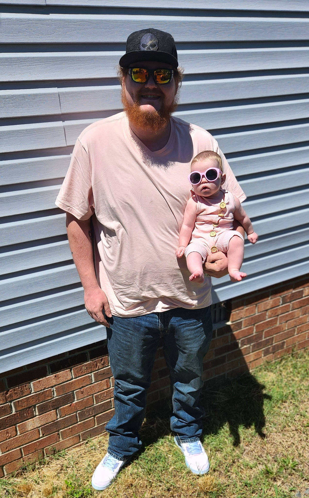 Parker is registered to the contest to win money with this photo: baseball_cap, beard, belt, cap, companion_dog, cool, eyewear, facial_hair, glasses, goggles, grass, hairstyle, hat, headgear, headwear, joy, person, photograph, sleeve, sunglasses