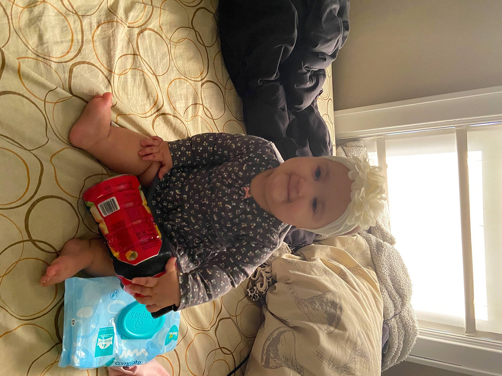 Renesmee is registered to the contest to win money with this photo: arm, baby, birth, child, comfort, finger, headwear, joy, leg, person, play, room, sleep, toddler