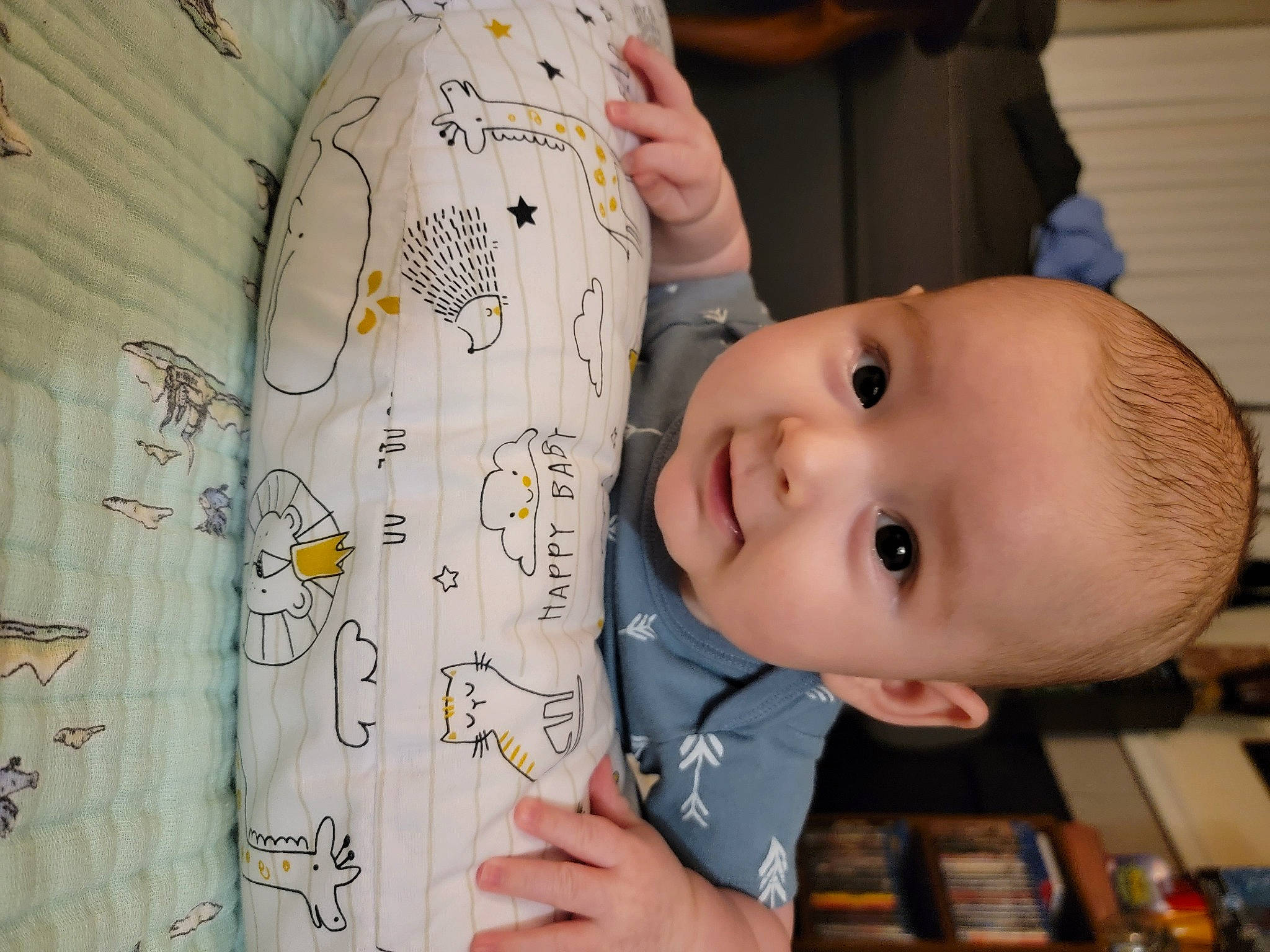 Gambit is registered to the contest to win money with this photo: baby, baby_toddler_clothing, cheek, child, finger, fun, gesture, hairstyle, hand, happy, mammal, nose, person, product, room, skin, sleeve, smile, toddler, tree