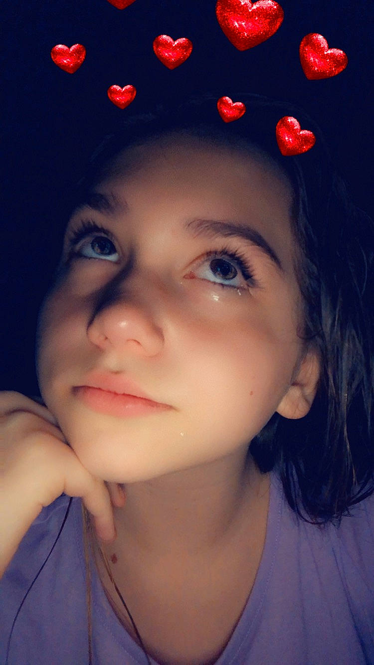 Carlee is registered to the contest to win money with this photo: beauty, black_hair, blue, cheek, chin, close_up, ear, eye, eyebrow, face, forehead, hair, hairstyle, head, lady, lip, nose, person, red, skin