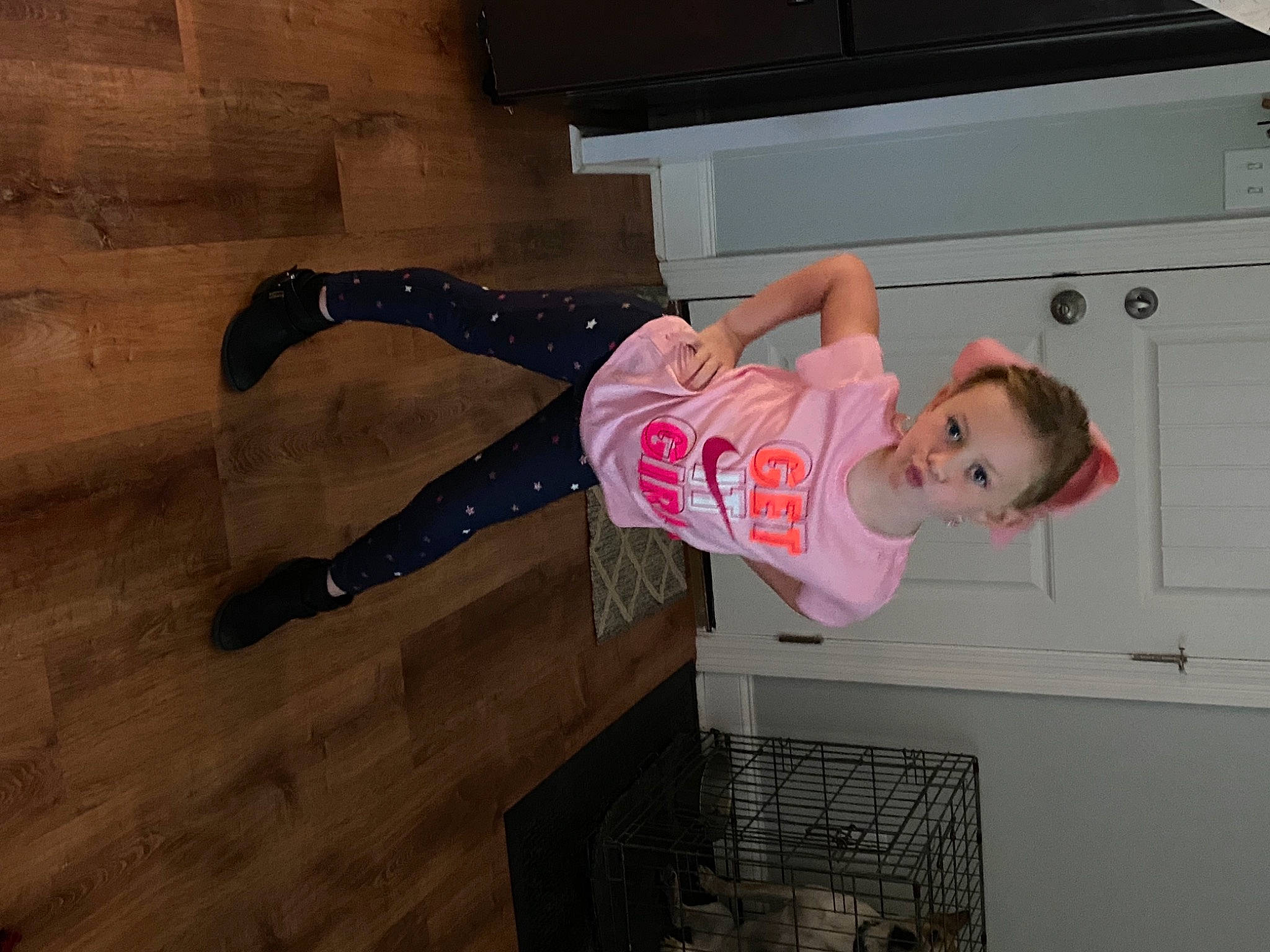 Taylynn is registered to the contest to win money with this photo: child, drawer, flooring, fun, hardwood, human_leg, machine, office_equipment, office_supplies, peripheral, person, photocopier, printer, room, smile, thigh, toddler, wood