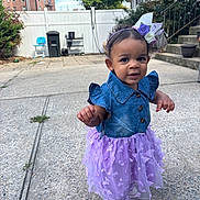 Amelia is registered to the contest to win money with this photo: child, toddler, baby, portrait, outdoor, smiling, dress, tutu, purple, butterfly, flower_crown, denim, shoes, standing, driveway, sidewalk, house, backyard, residential, fashion