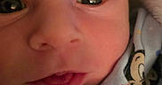 Gunner joined the competition — help win amazing prizes! adorable, baby, cartoon_characters, child, close_up, clothing, cute, expression, eyes, face, head, indoor, infant, mouth, newborn, onesie, portrait, skin, small, soft