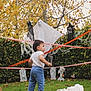 Austin joined the competition — help win amazing prizes! toddler, child, grass, autumn, leaves, halloween, ghost_decoration, tombstone, caution_tape, tree, bush, outdoor, costume, holiday, scary, yard, white_cloth, greenery, daytime, curious