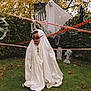 Austin joined the competition — help win amazing prizes! child, toddler, ghost_costume, white_sheet, sunglasses, halloween, decorations, ghost, tombstone, caution_tape, spider_web, grass, leaves, autumn, outdoor, yard, holiday, fun, costume, playful
