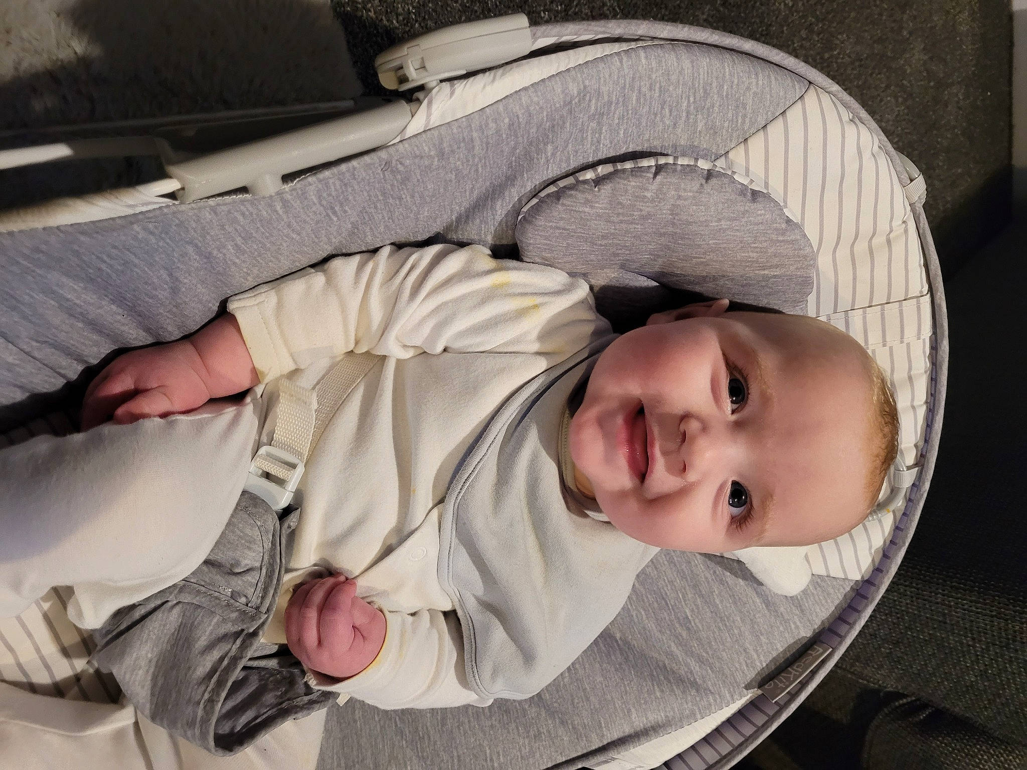 Brodie is registered to the contest to win money with this photo: baby, baby_carriage, baby_products, baby_toddler_clothing, car_seat, cheek, child, comfort, hat, linens, mouth, nap, person, sitting, sleep, sleeve, smile, toddler, tree