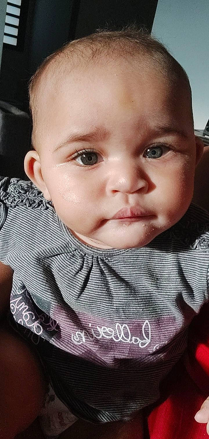 Krystal participe au concours pour gagner de l'argent avec cette photo : baby, baby_toddler_clothing, cheek, chin, eyebrow, eyelash, facial_expression, flash_photography, hairstyle, human, iris, lip, mouth, neck, nose, organ, outerwear, person, product, skin