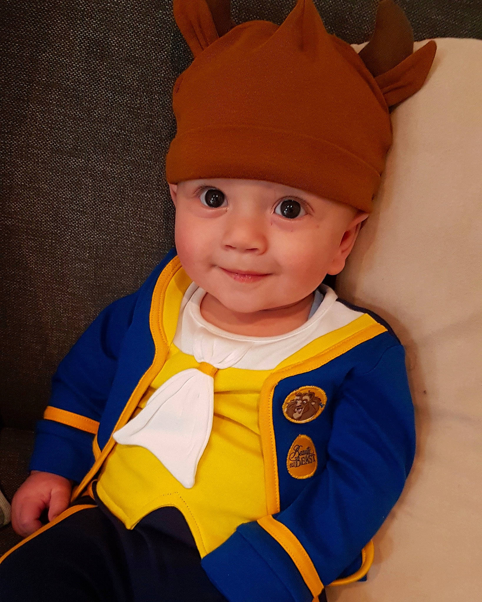 Andreas is registered to the contest to win money with this photo: baby, beanie, cap, child, costume, costume_accessory, costume_hat, hat, headgear, headwear, joy, person, sleeve, toddler