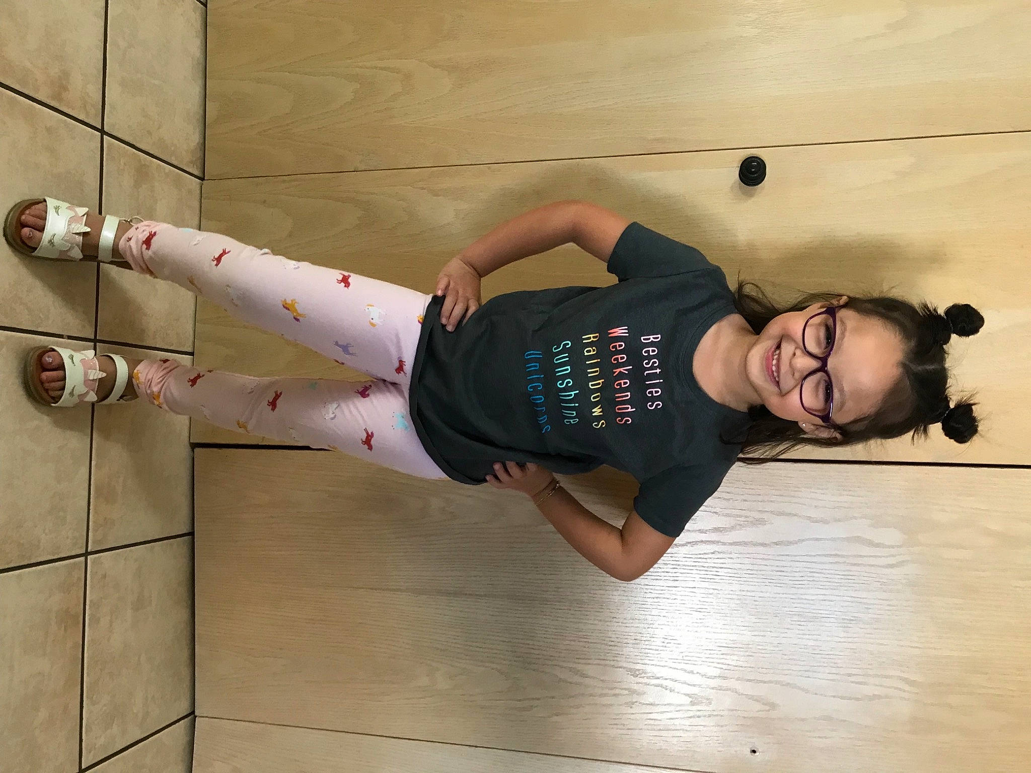 Lina is registered to the contest to win money with this photo: clothing, elbow, flash_photography, floor, flooring, hardwood, human_leg, joint, joy, knee, leg, outdoor_shoe, person, shoe, smile, sneakers, sportswear, t_shirt, thigh, trunk