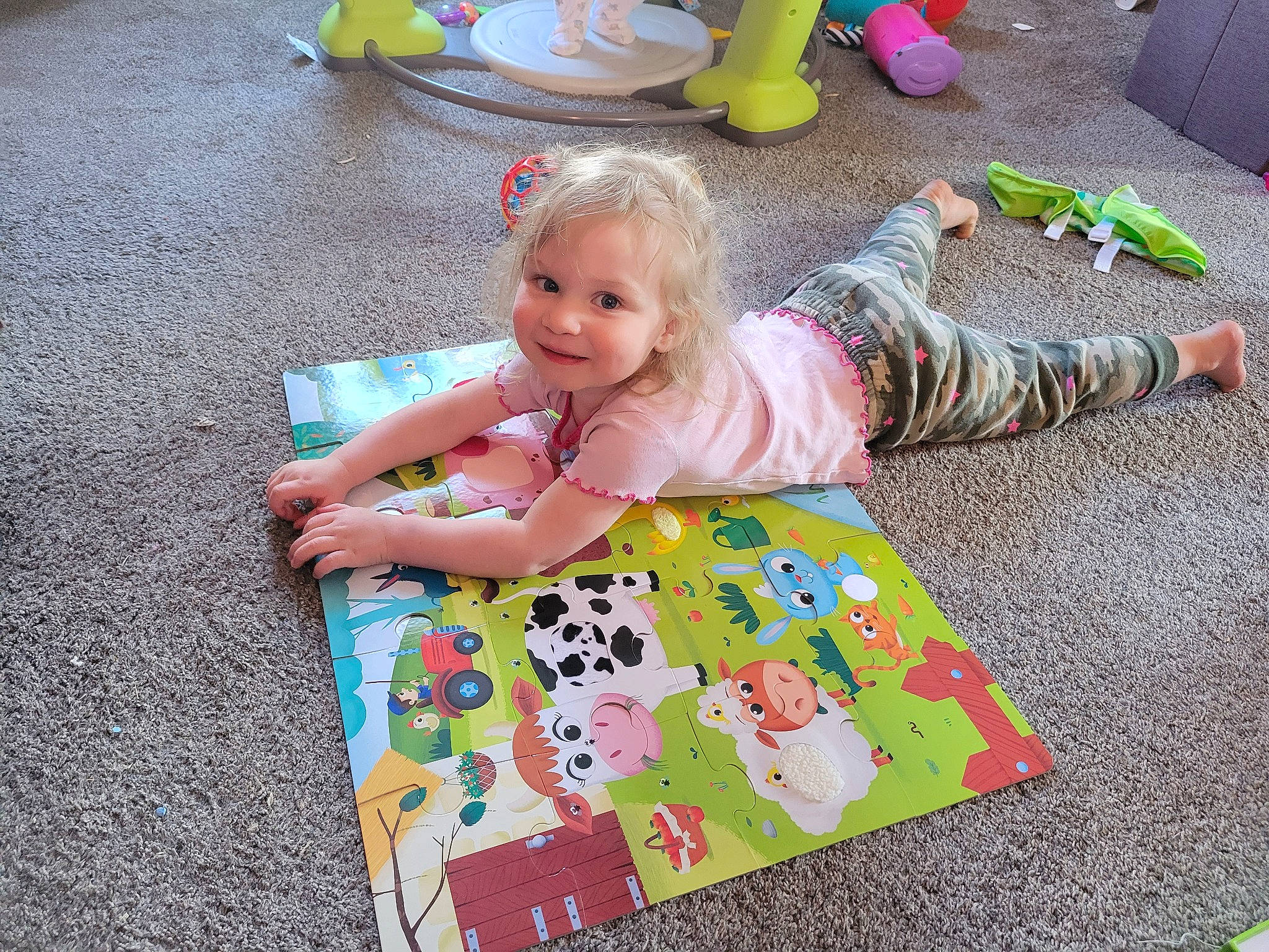 Izzy is registered to the contest to win money with this photo: baby, baby_products, baby_toddler_clothing, child, design, floor, flooring, fun, grass, happy, joy, mammal, pattern, person, pink, play, product, smile, toddler, toy