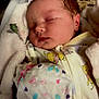 April is registered to the contest to win money with this photo: baby, newborn, sleeping, blanket, onesie, cute, infant, child, soft, cozy, face, peaceful, indoors, clothing, closeup, portrait, rest, young, comfort, toddler