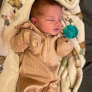 April joined the competition — help win amazing prizes! baby, sleeping, blanket, onesie, pacifier, infant, soft, cozy, cute, child, face, peaceful, rest, comfort, newborn, clothing, lying_down, bed, portrait, warm