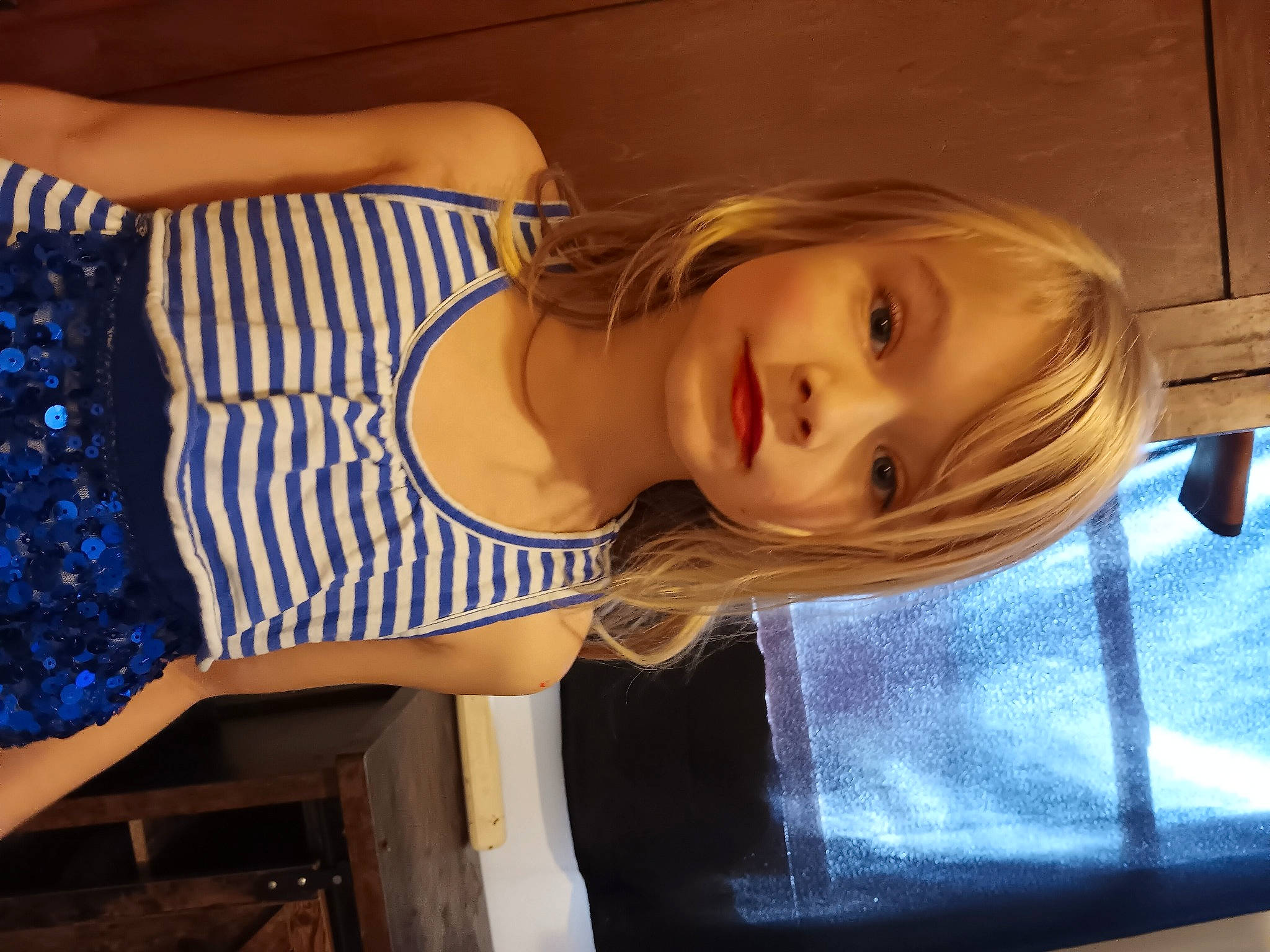 Kensley is registered to the contest to win money with this photo: blond, blue, brown_hair, chest, electric_blue, eyelash, facial_expression, flash_photography, fun, hairstyle, happy, human_leg, lip, long_hair, person, shoulder, smile, thigh, trunk, vehicle_door