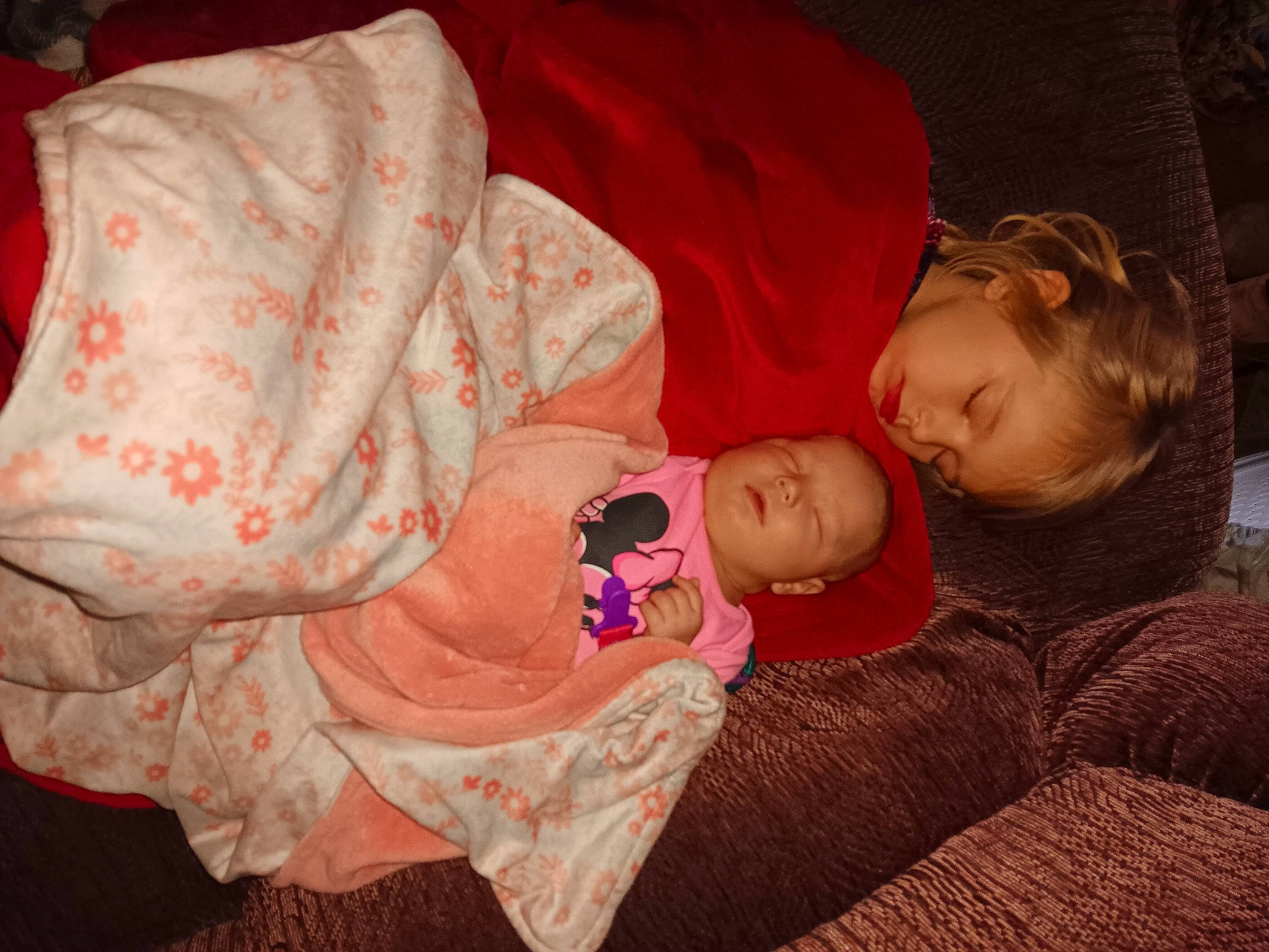 Ariel is registered to the contest to win money with this photo: baby, baby_toddler_clothing, bedtime, cheek, child, comfort, couch, eye, face, fun, magenta, nap, peach, person, room, sitting, sleep, textile, toddler, tree