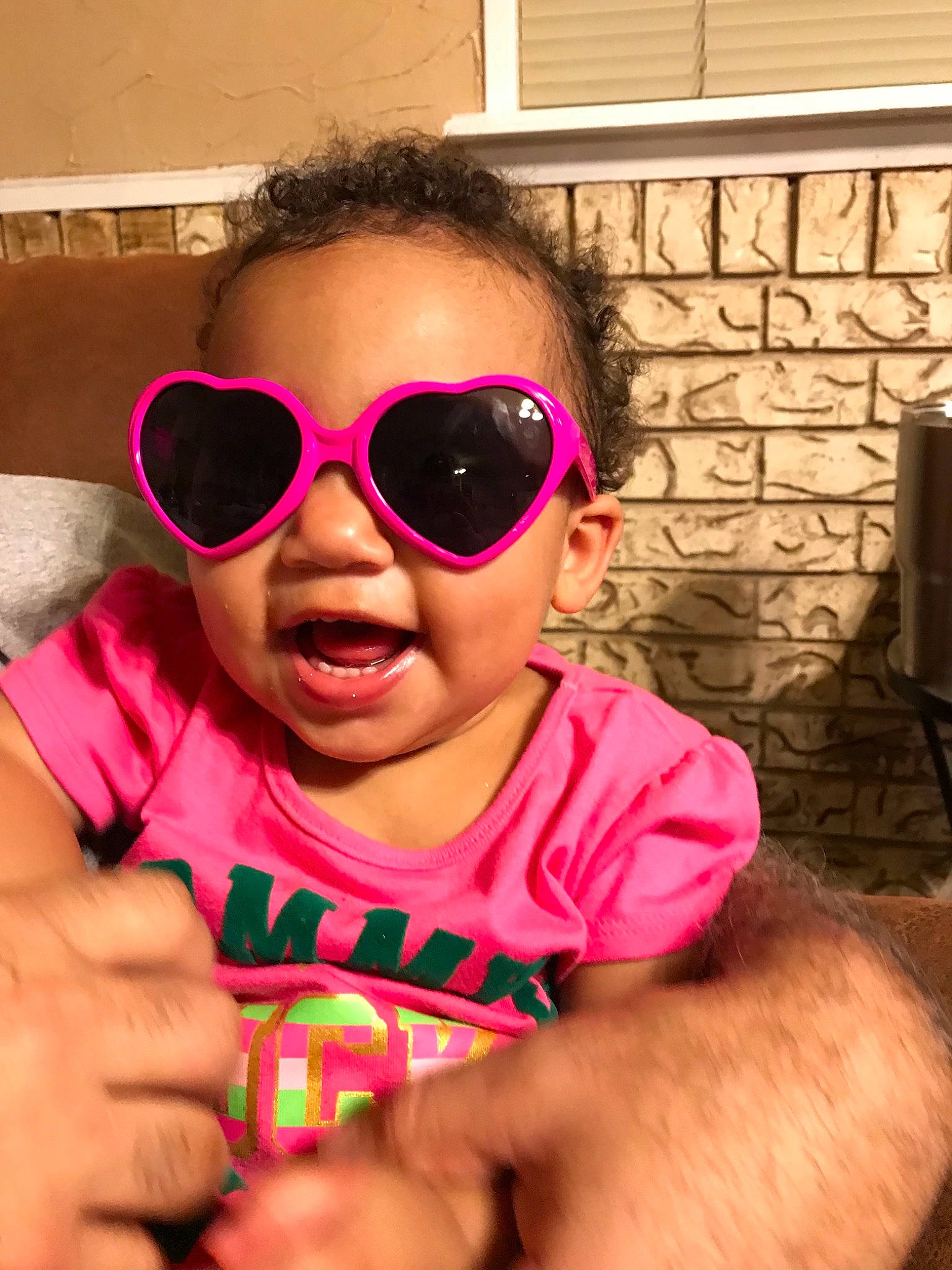 Jacelyn is registered to the contest to win money with this photo: cheek, child, cool, eyewear, face, forehead, fun, glasses, goggles, head, lip, magenta, mouth, nose, person, personal_protective_equipment, pink, skin, smile, sunglasses