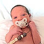 Grayson joined the competition — help win amazing prizes! baby, infant, newborn, pacifier, pacifier_clip, beads, name_beads, face, eyes, hand, bare_chest, white_bedding, blanket, portrait, closeup, soft_light, sleepy, skin, head, indoor