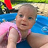 baby, child, pool, water, swimsuit, pink, tutu, blue_eyes, outdoor, sunny, grass, hand, legs, skin, playful, summer, cute, infant, backyard, traffic_cone
